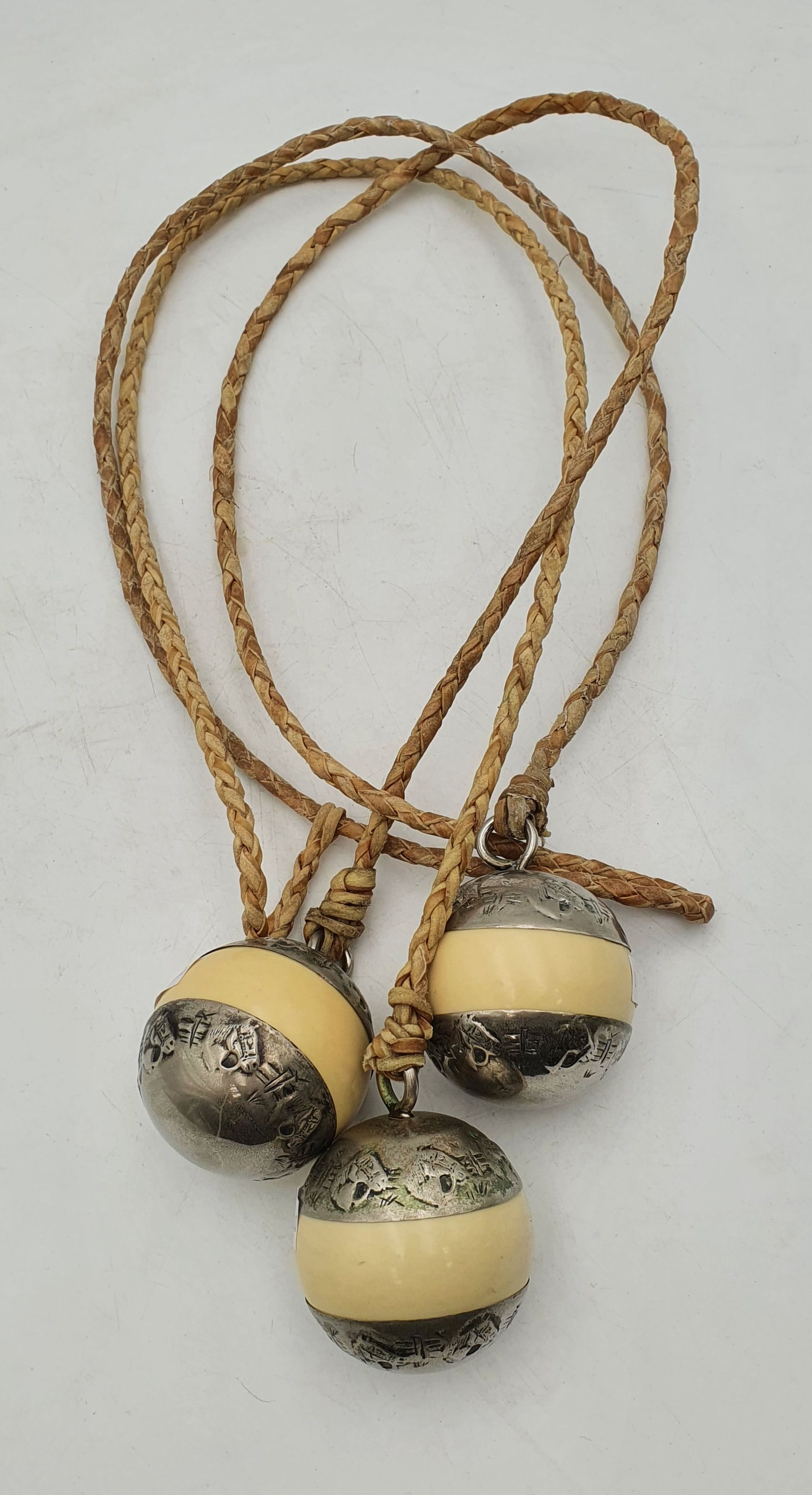 A Set Of Three Argentinian Boleadora