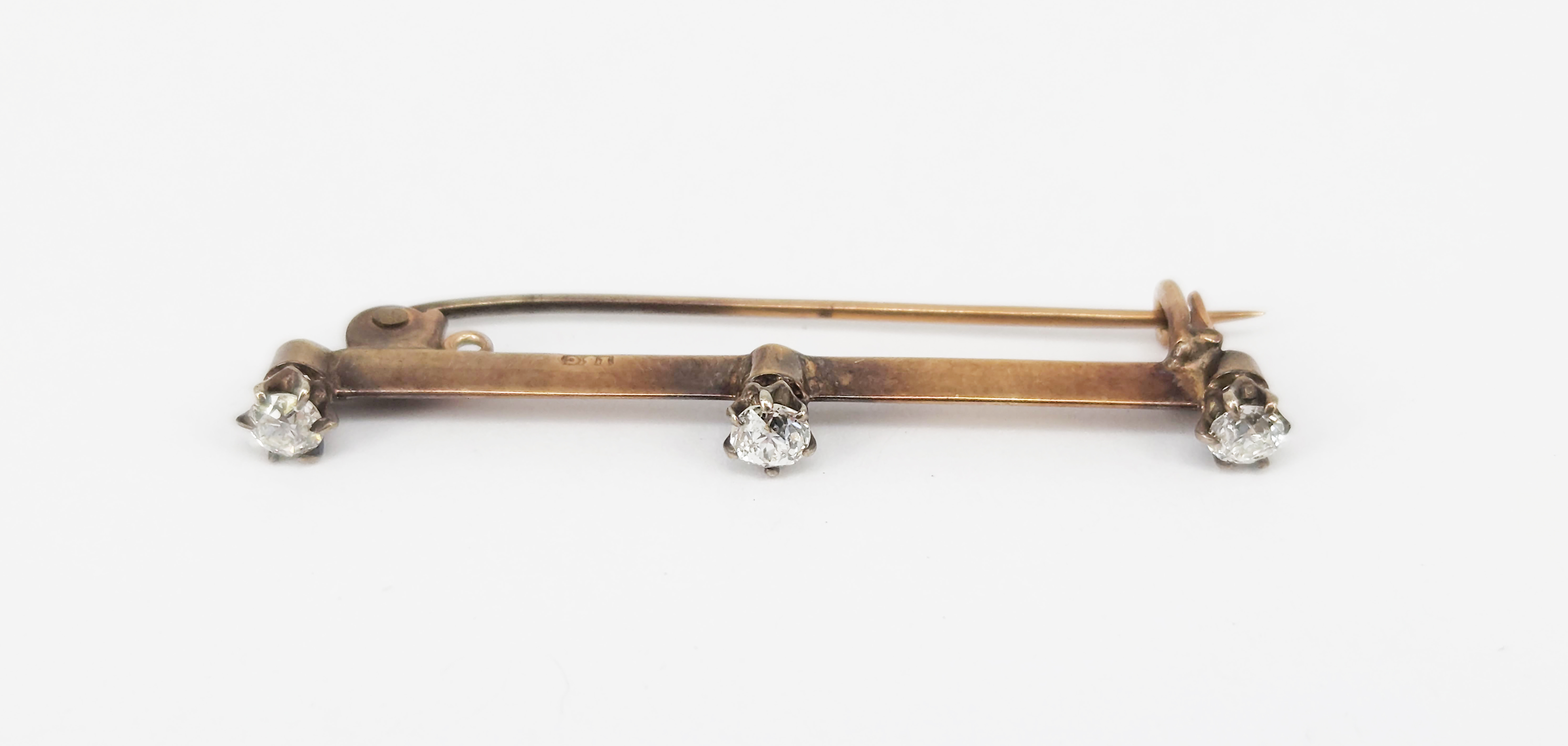 An Antique 15ct Yellow Gold And Three-Stone Old-Cut Diamond Bar Brooch