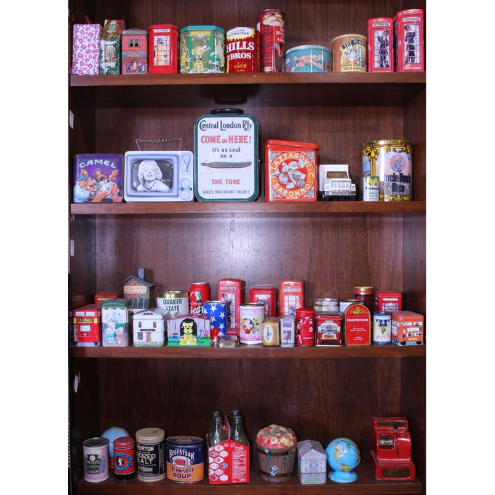 Tin advertising containers, lunch boxes, and piggy banks; including Lazzaroni, Uncle Ben's Rice, Camel, etc