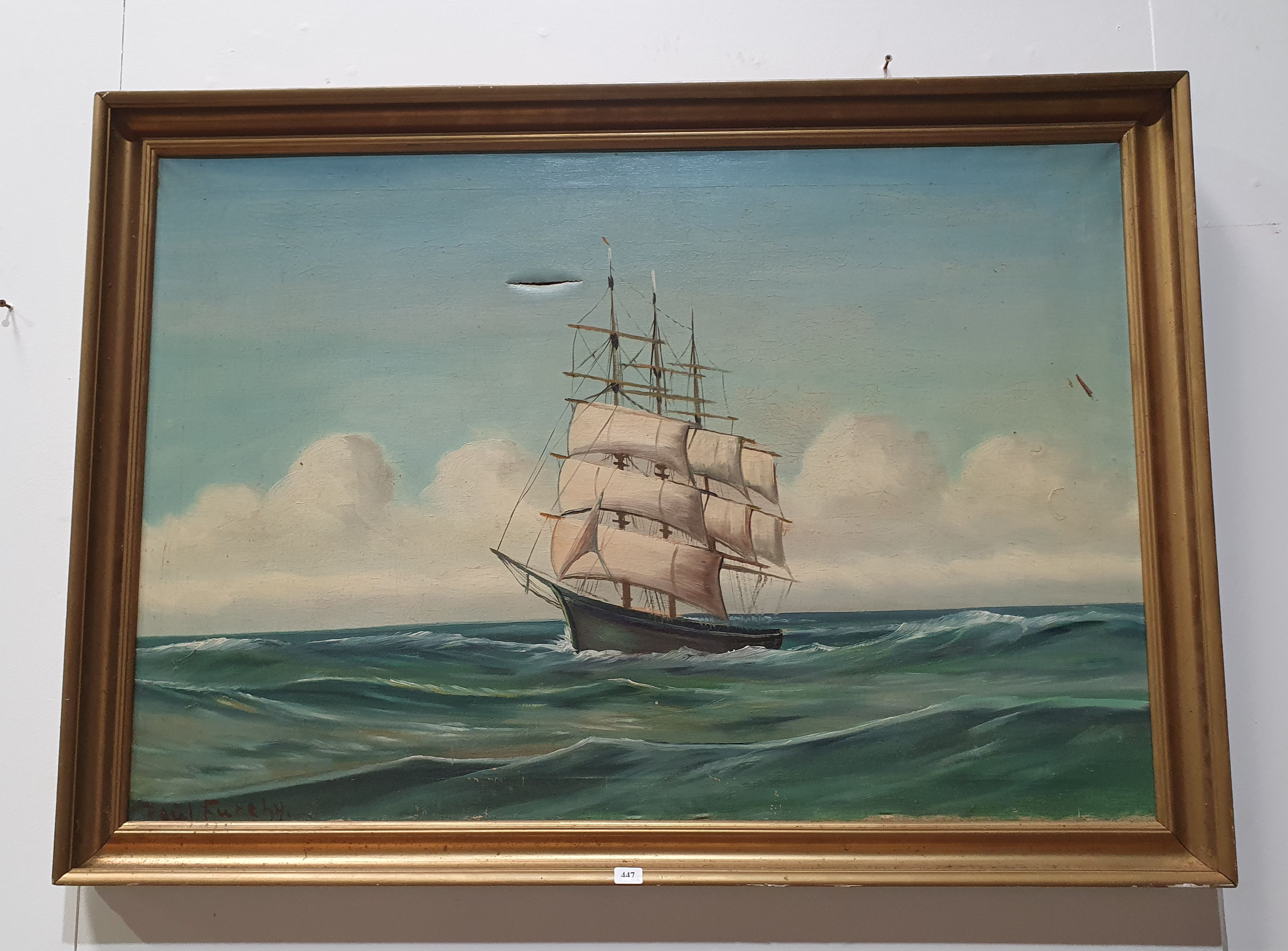 A FRAMED PAINTING OF A SHIP
