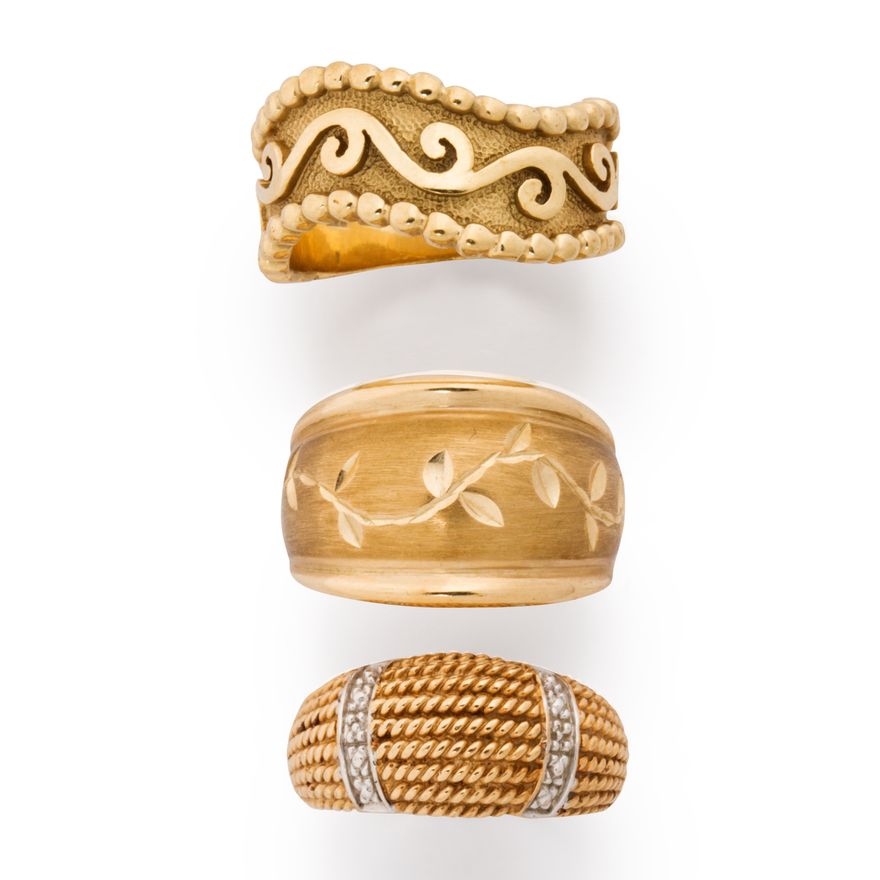 A group of ten karat gold ring