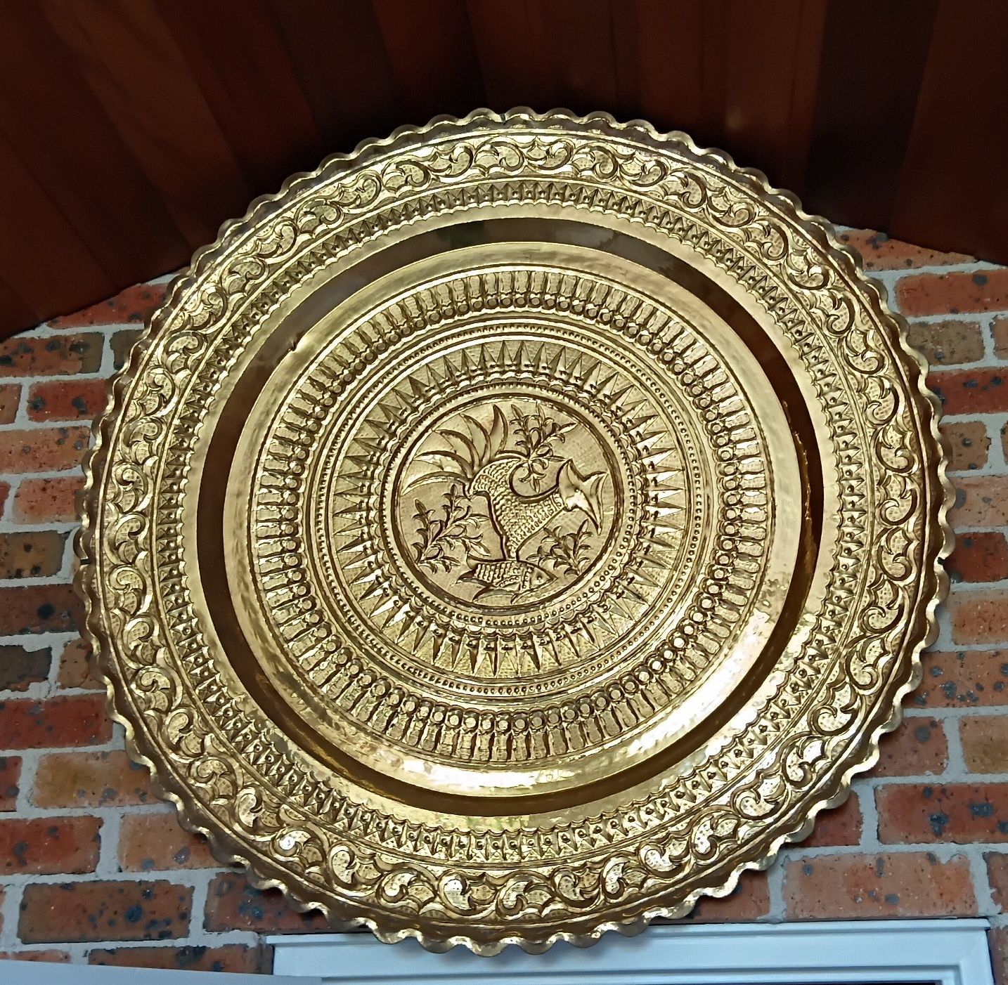 A MEXICAN MAYA YUCATAN PENINSULAR BRASS CHARGER