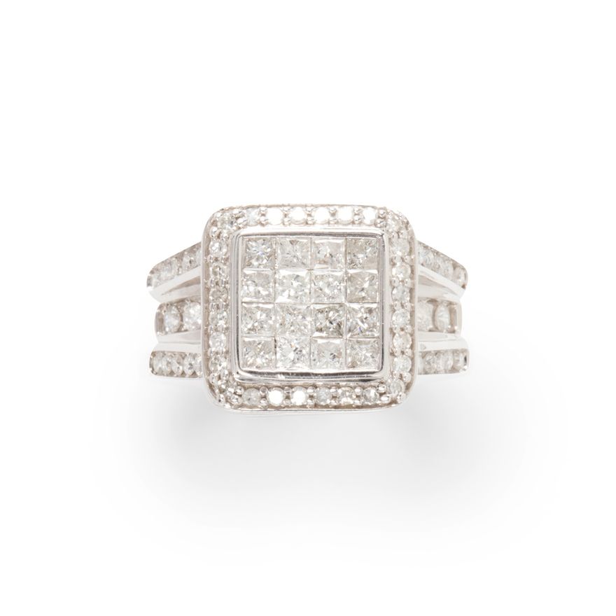 A diamond and fourteen karat white gold ring