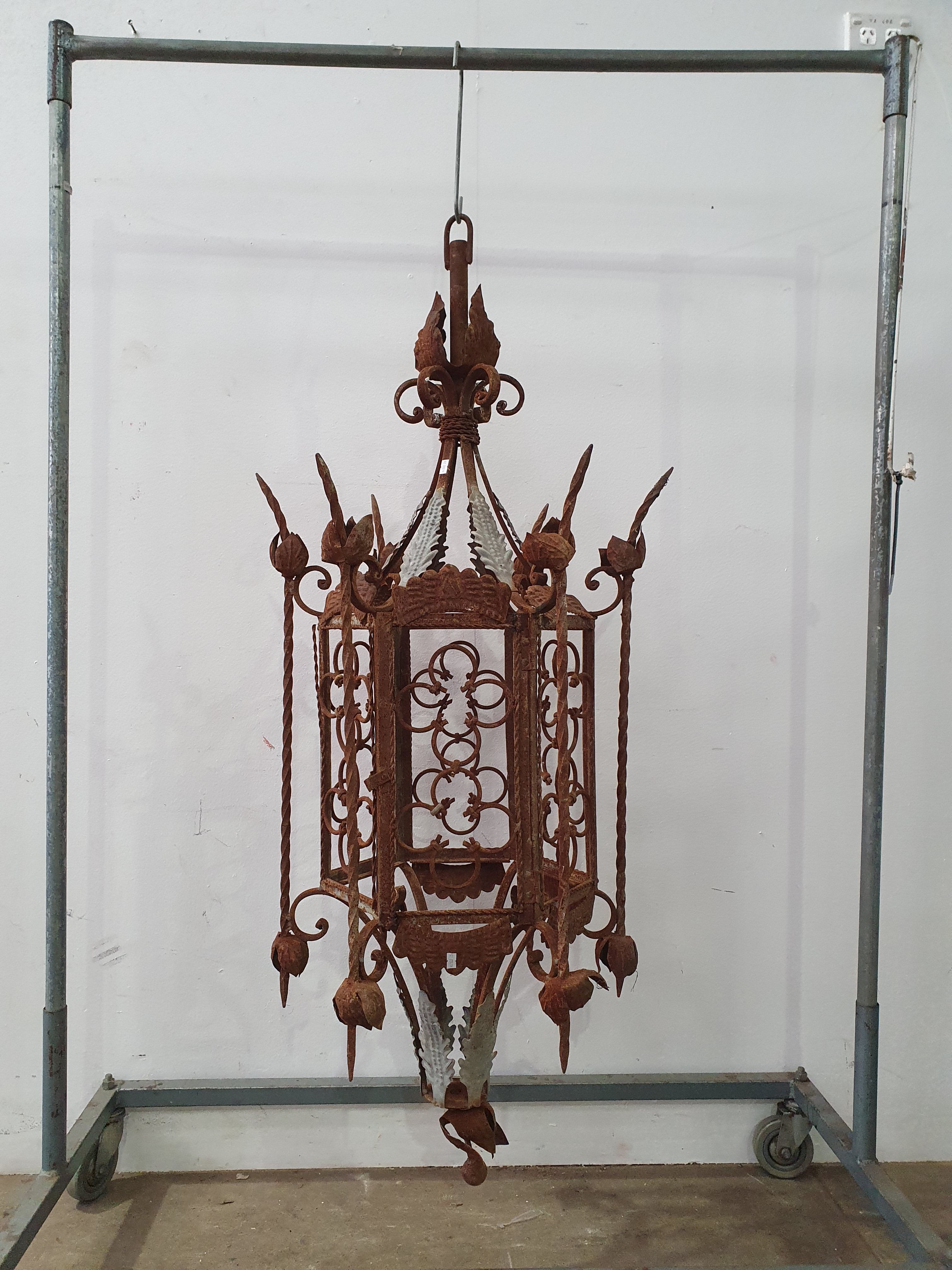 1199 · A LARGE WROUGHT IRON HANGING LANTERN