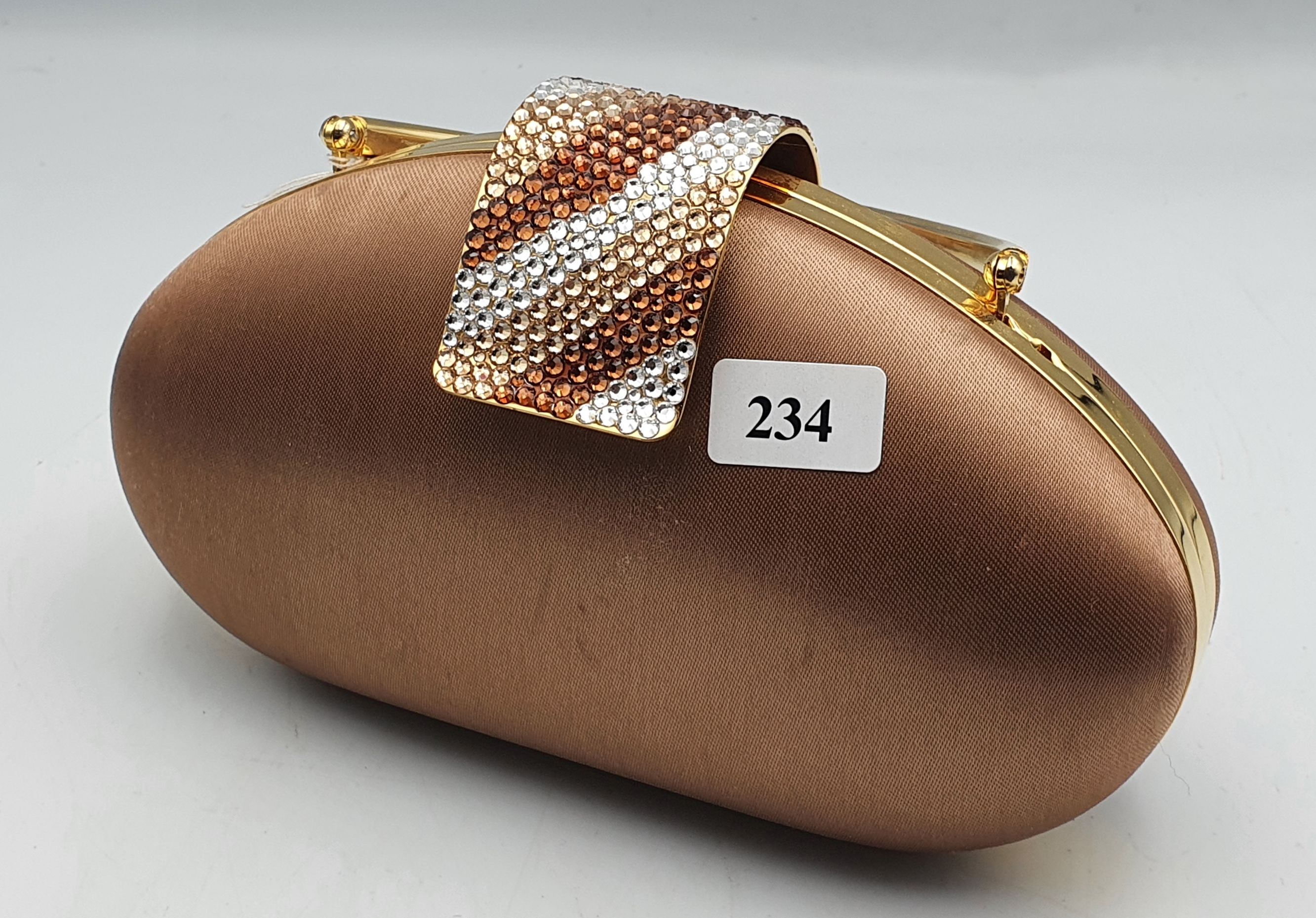 234 · AN EVENING PURSE WITH BEJEWELLED CLASP