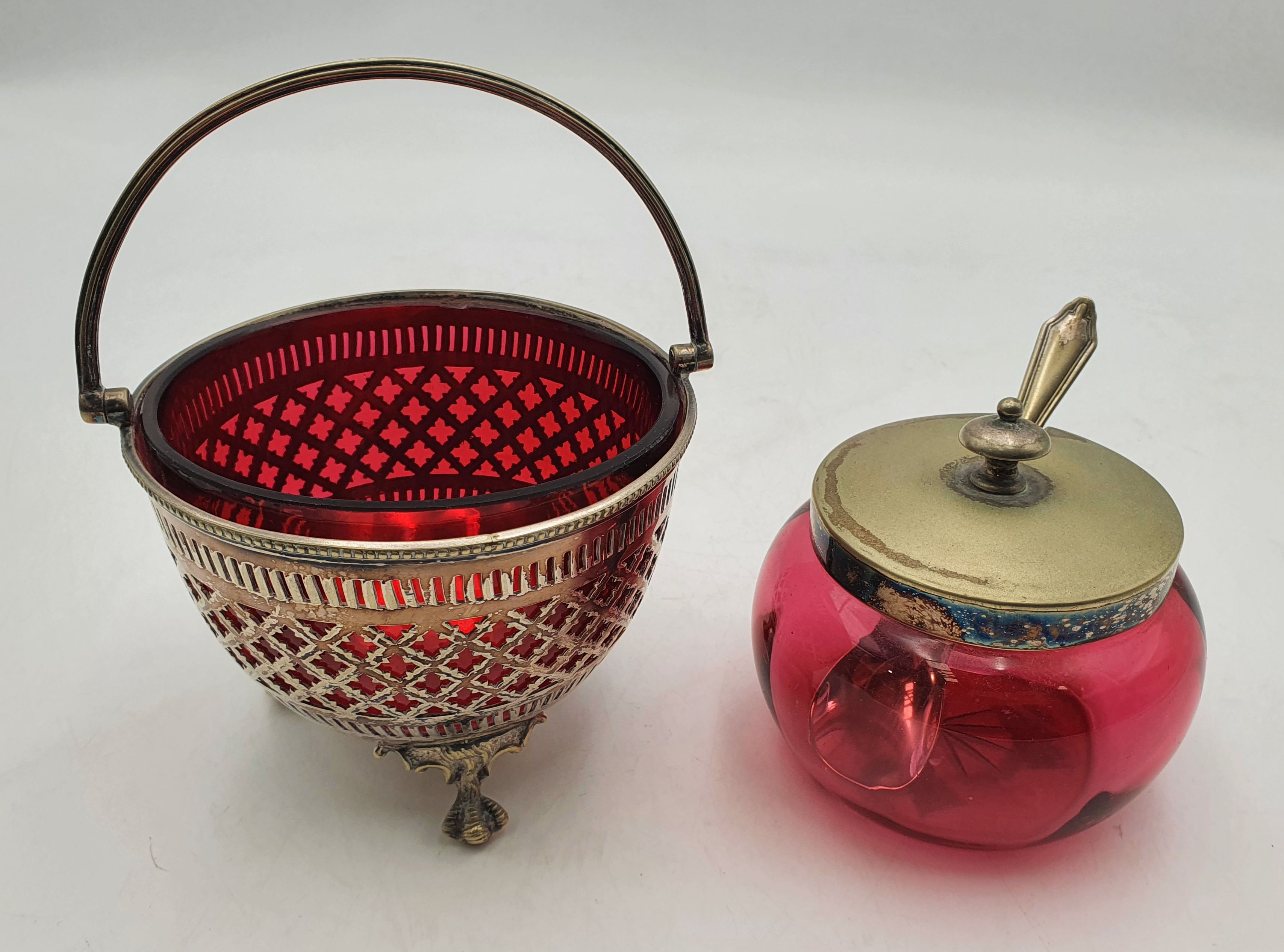 575 · A RUBY GLASS AND SILVER PLATED SUGAR BASKET