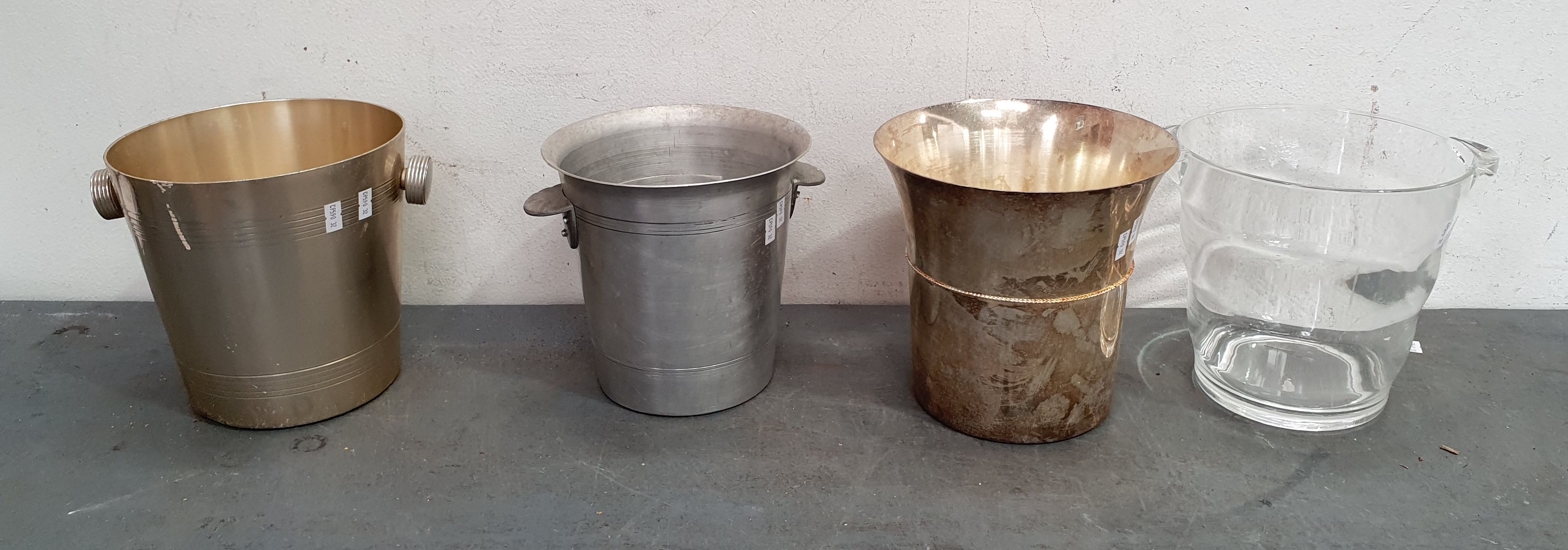 1275 · A GROUP OF FOUR CHAMPAGNE BUCKETS