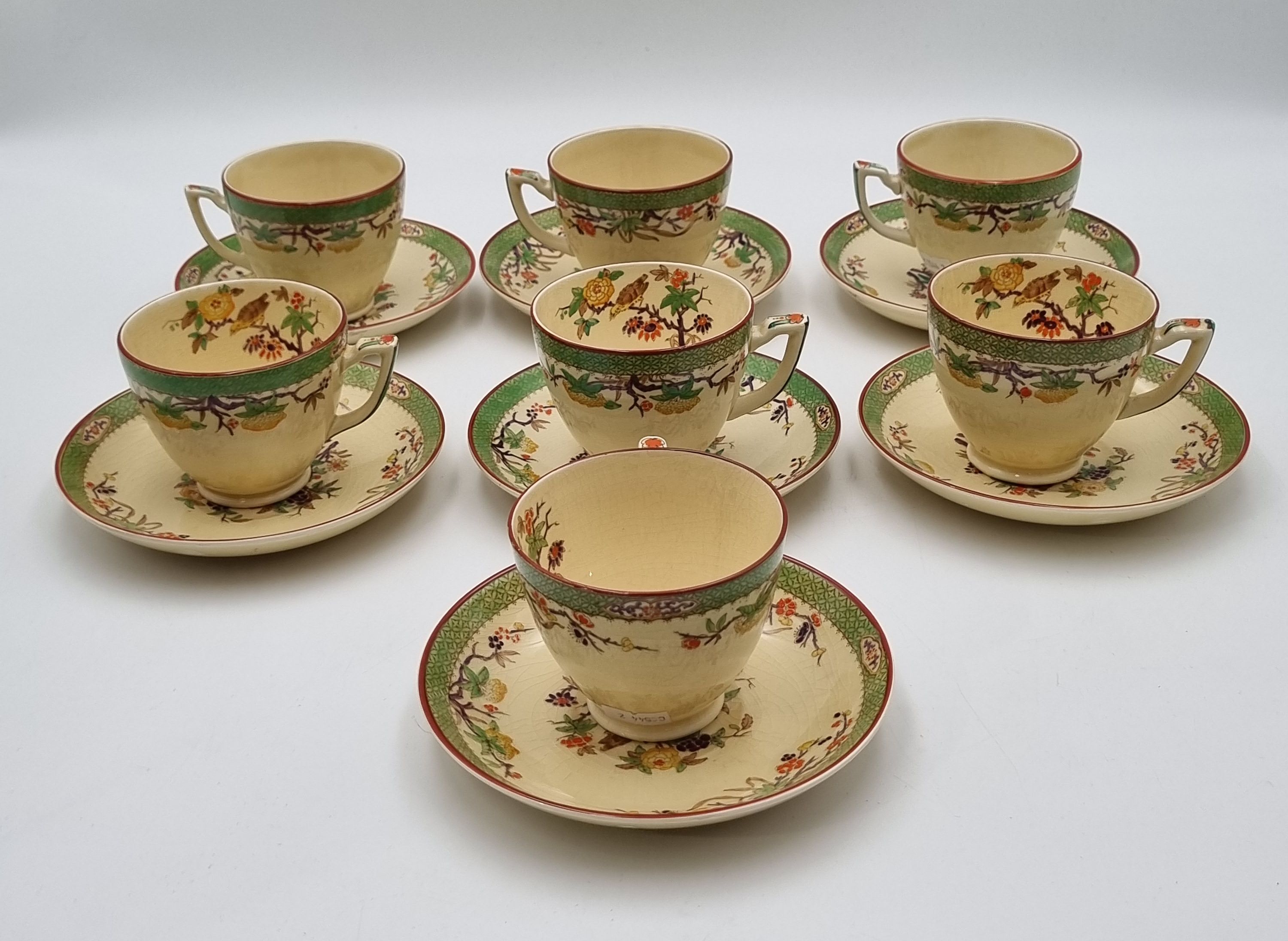 614 · SEVEN MINTONS CUPS AND SAUCERS