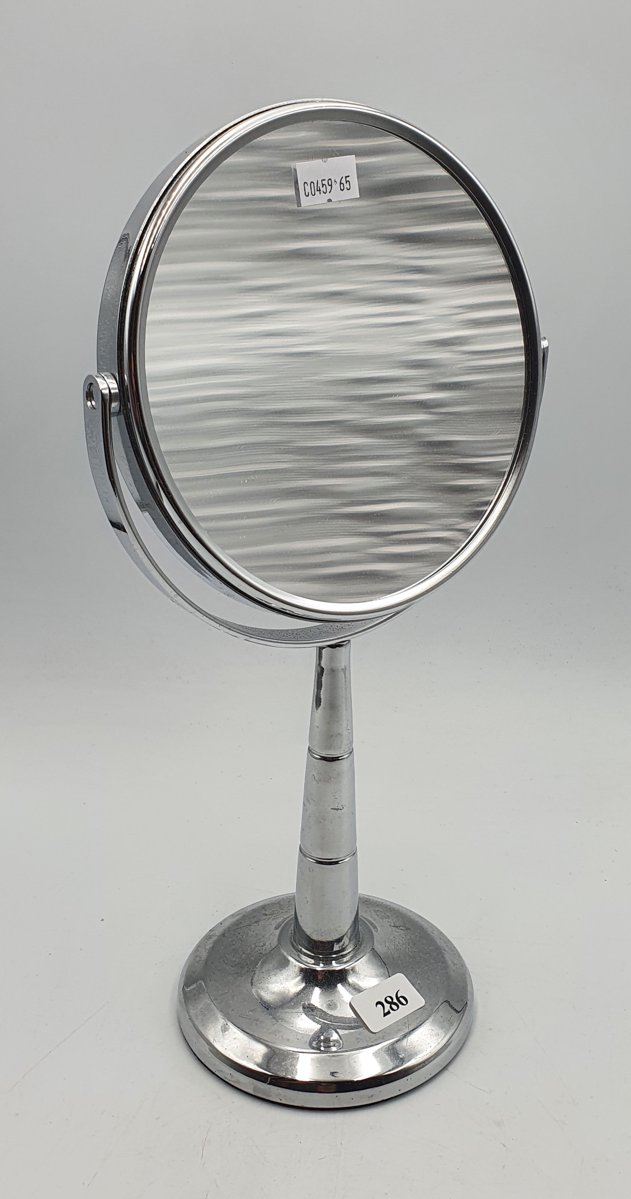286 · A DOUBLE SIDED SHAVING/MAKE UP MIRROR ON STAND