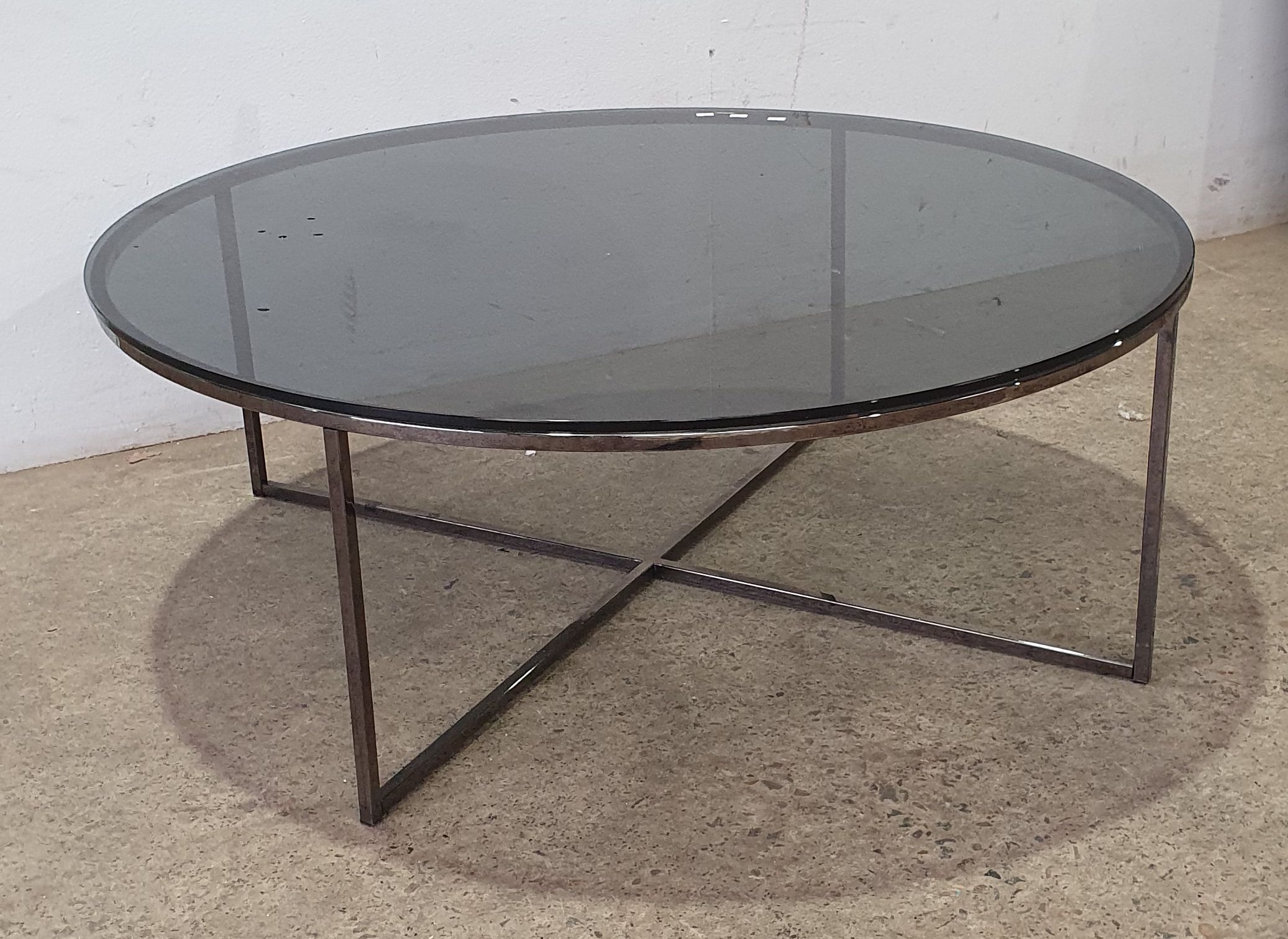 A Natuzzi Circular Glass Table