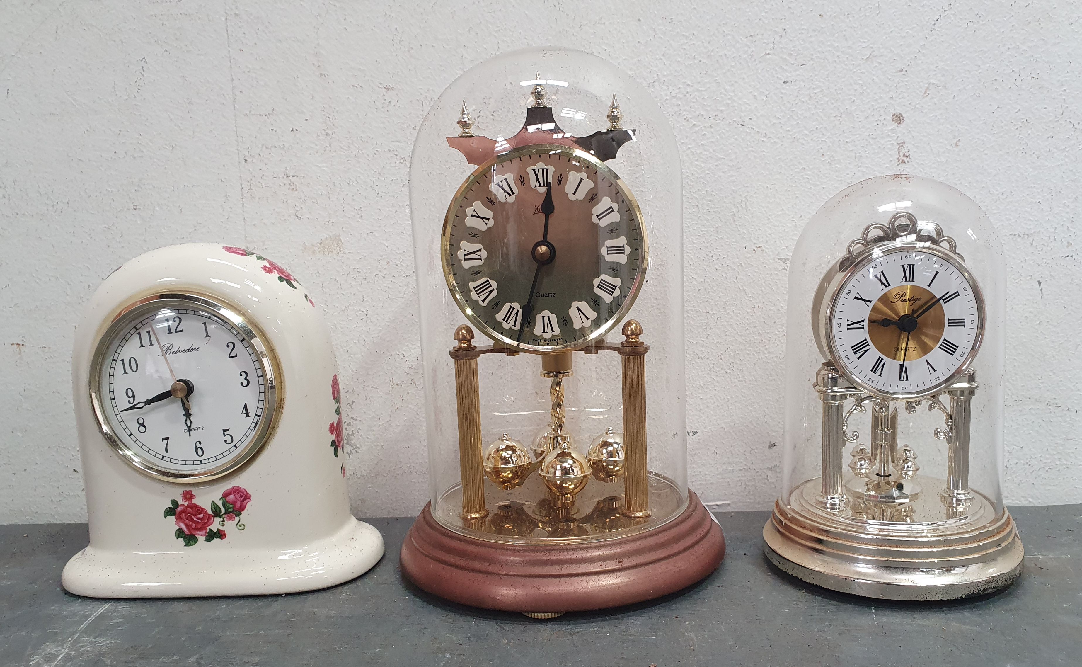 A GROUP OF THREE VARIOUS CLOCKS