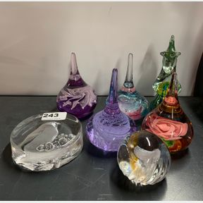 A signed Kosta Boda paperweight and others