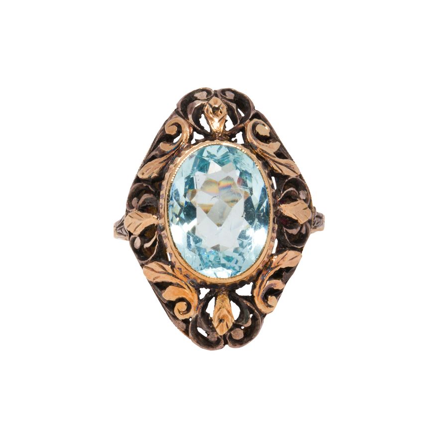 An antique blue topaz, 14k gold and silver ring