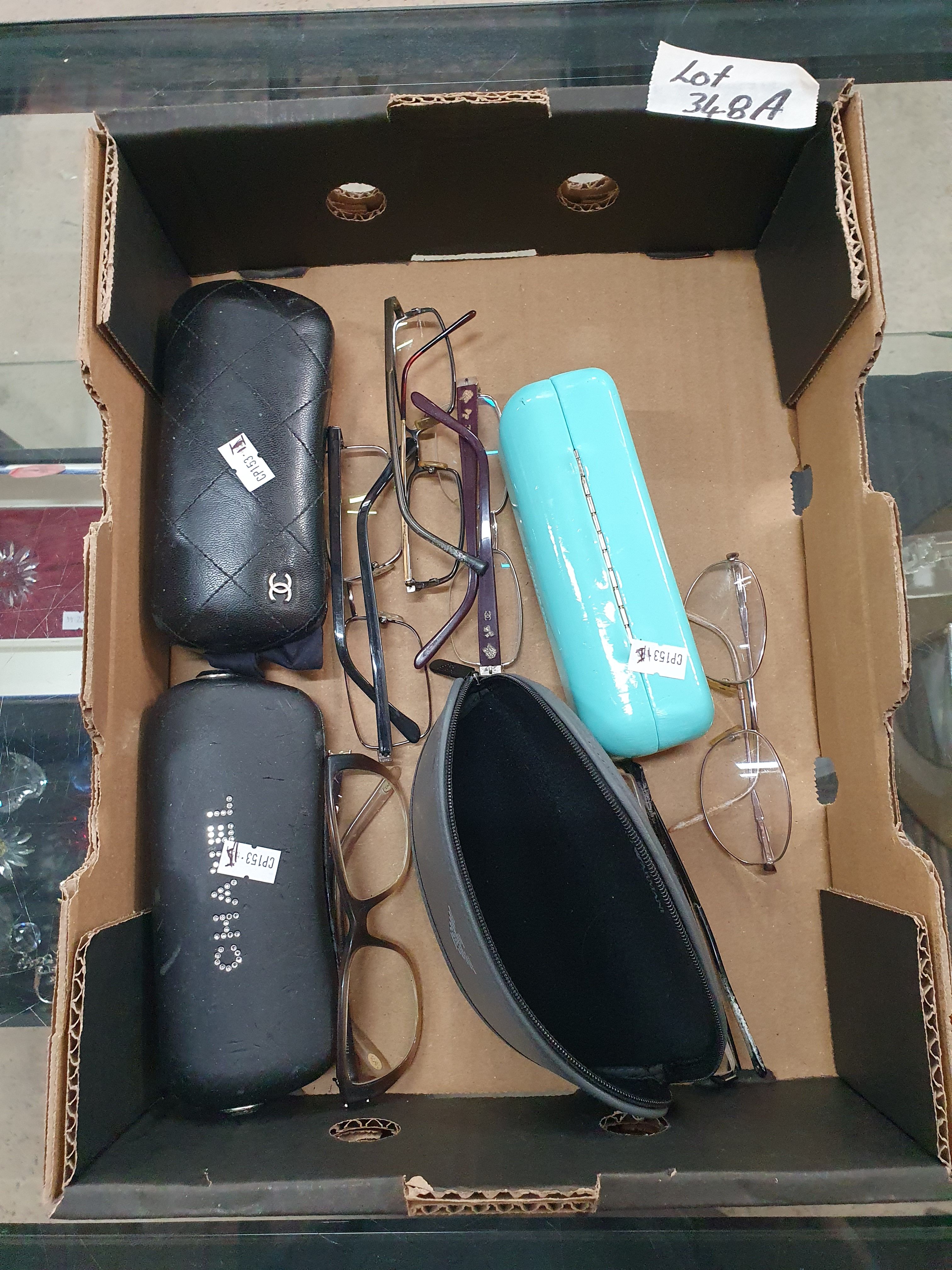 A GROUP OF DESIGNER SPECTACLE FRAMES AND BOXES