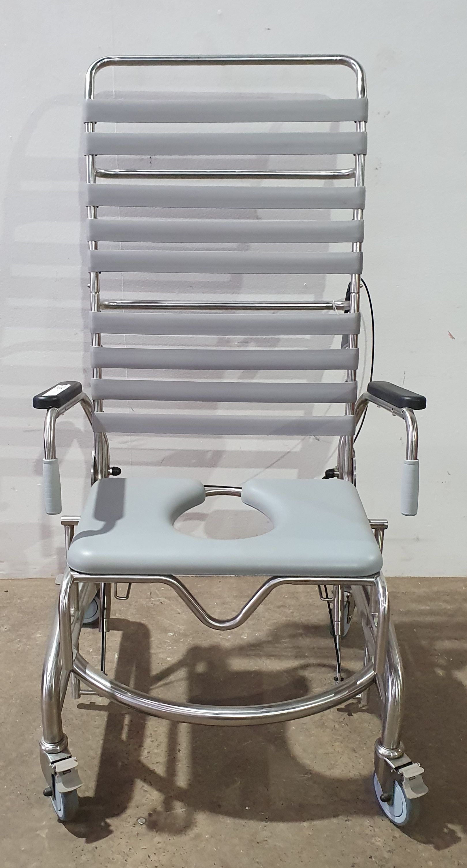 A Juvo Tilting Shower Commode