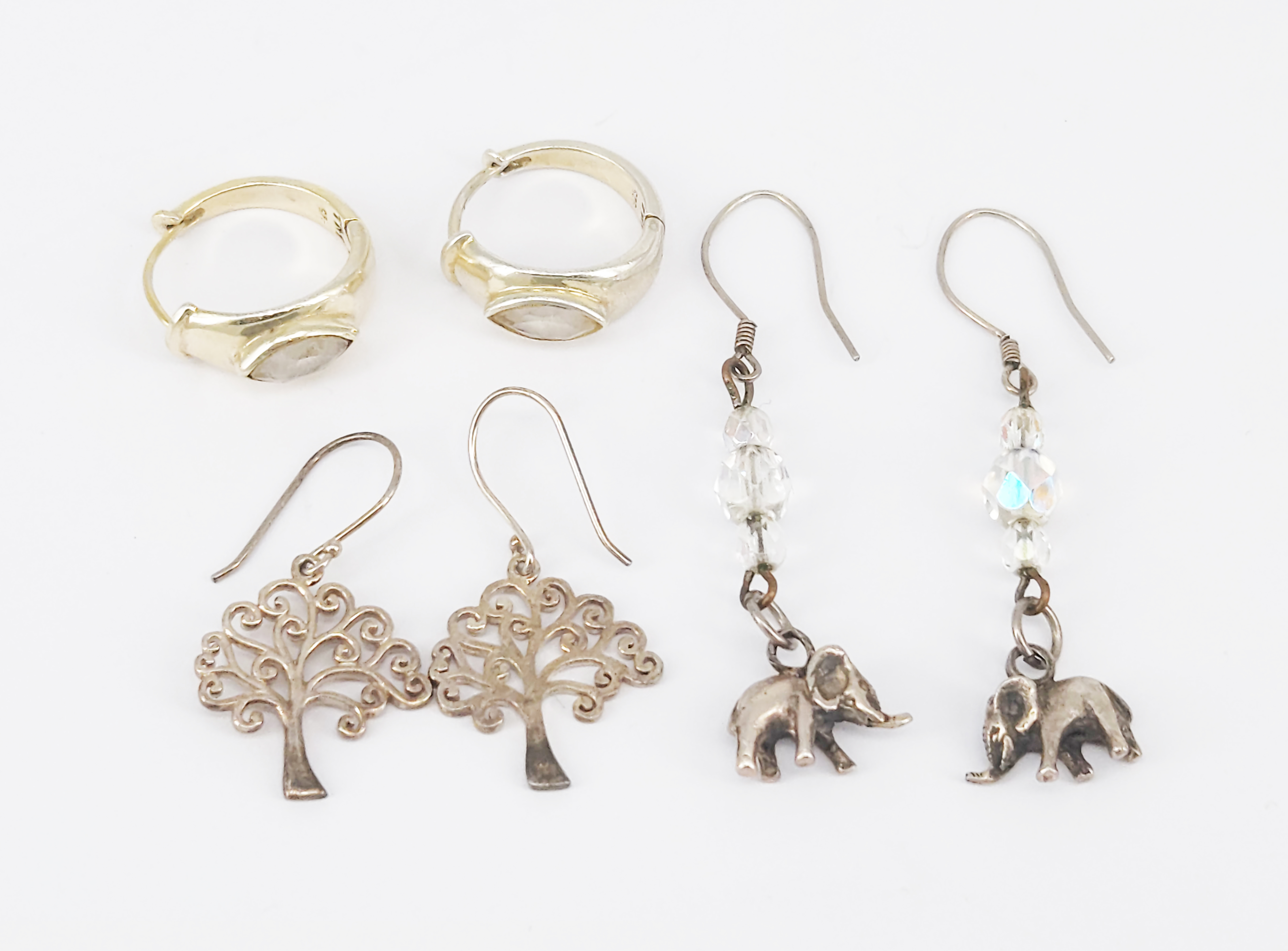 450 · THREE PAIRS OF SILVER DROP EARRINGS