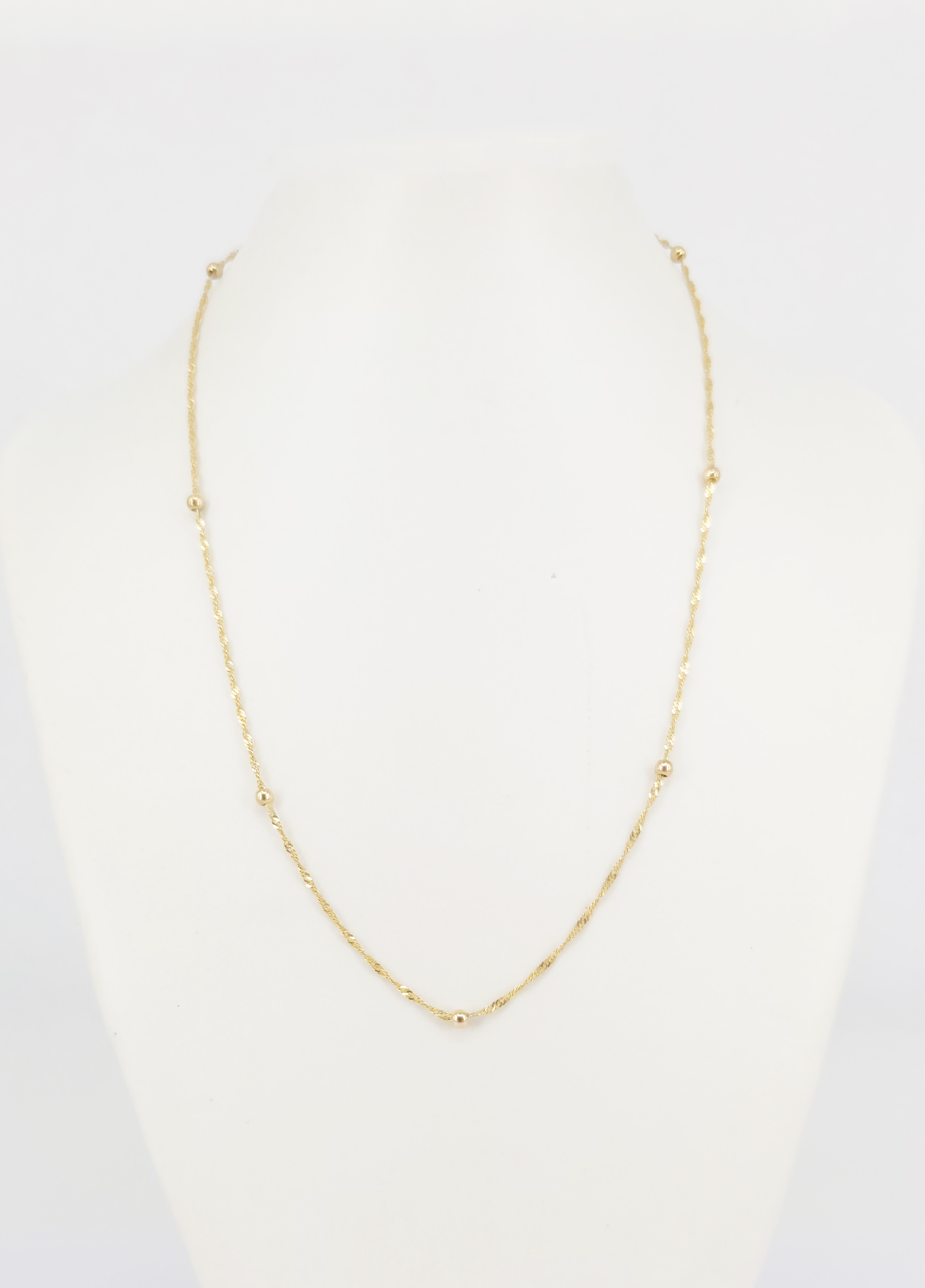 A 9ct Gold Ball And Singapore Link Chain