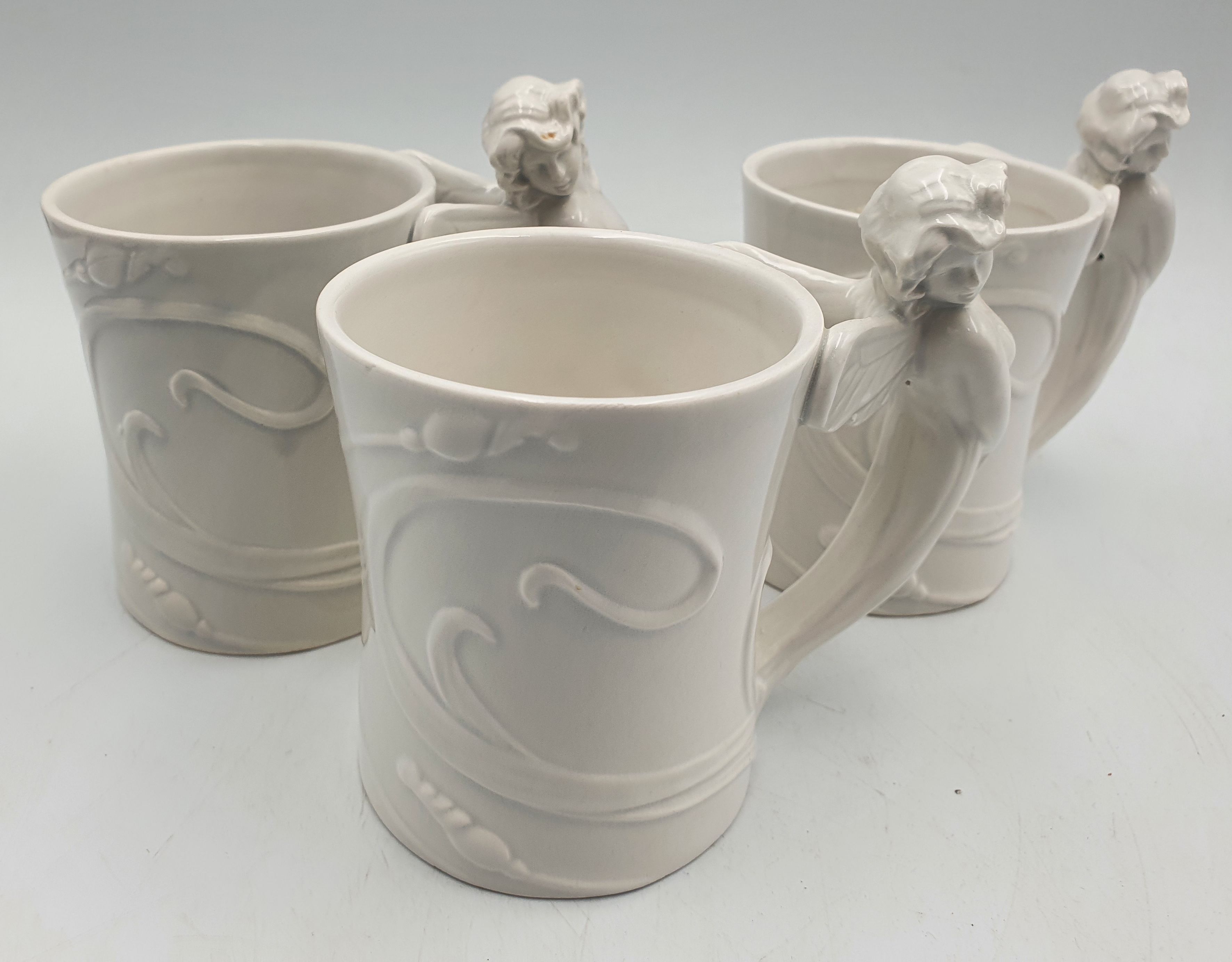 184 · THREE FITZ AND FLOYD FAIRY MUGS