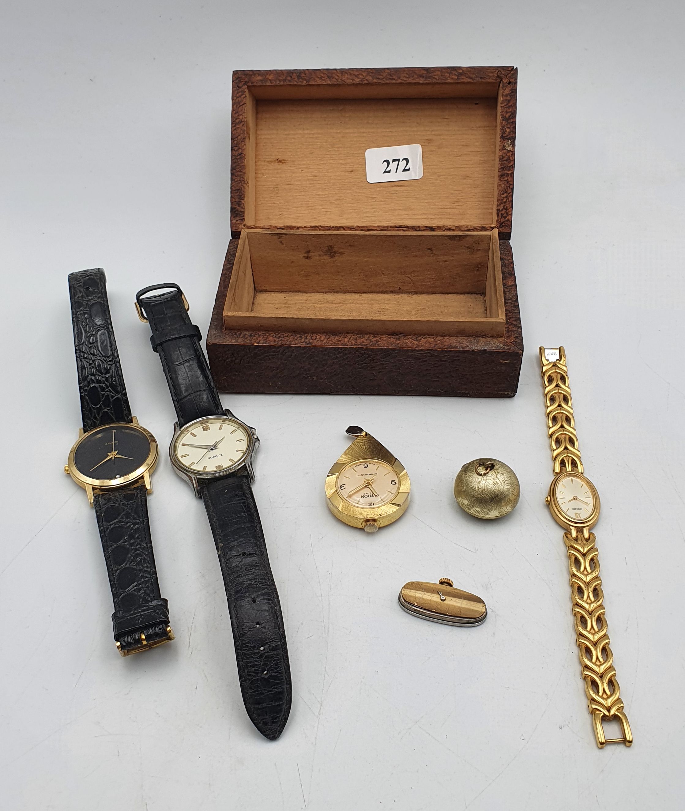 A SMALL BOX OF WATCHES