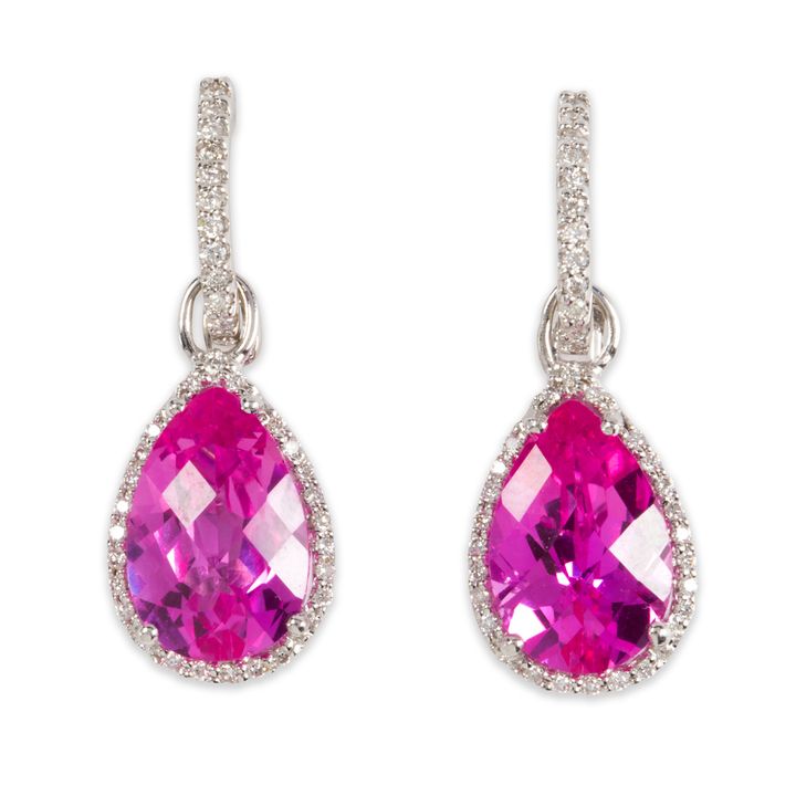 A pair of synthetic pink sapphire, diamond and eighteen karat white gold earrings