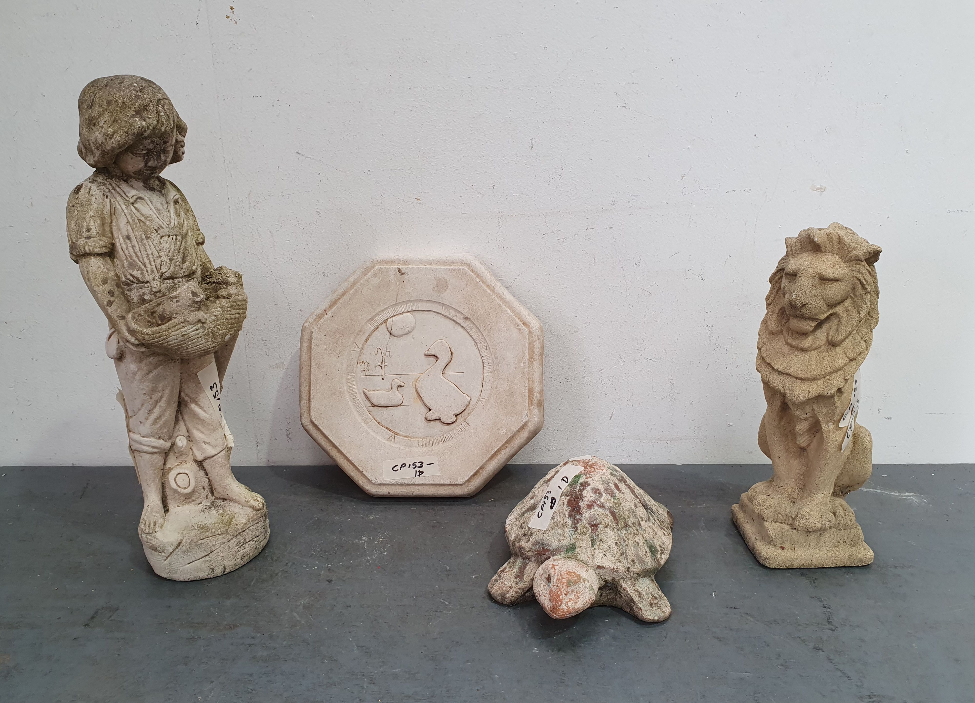1139 · A GROUP OF FOUR CONCRETE OUTDOOR STATUES