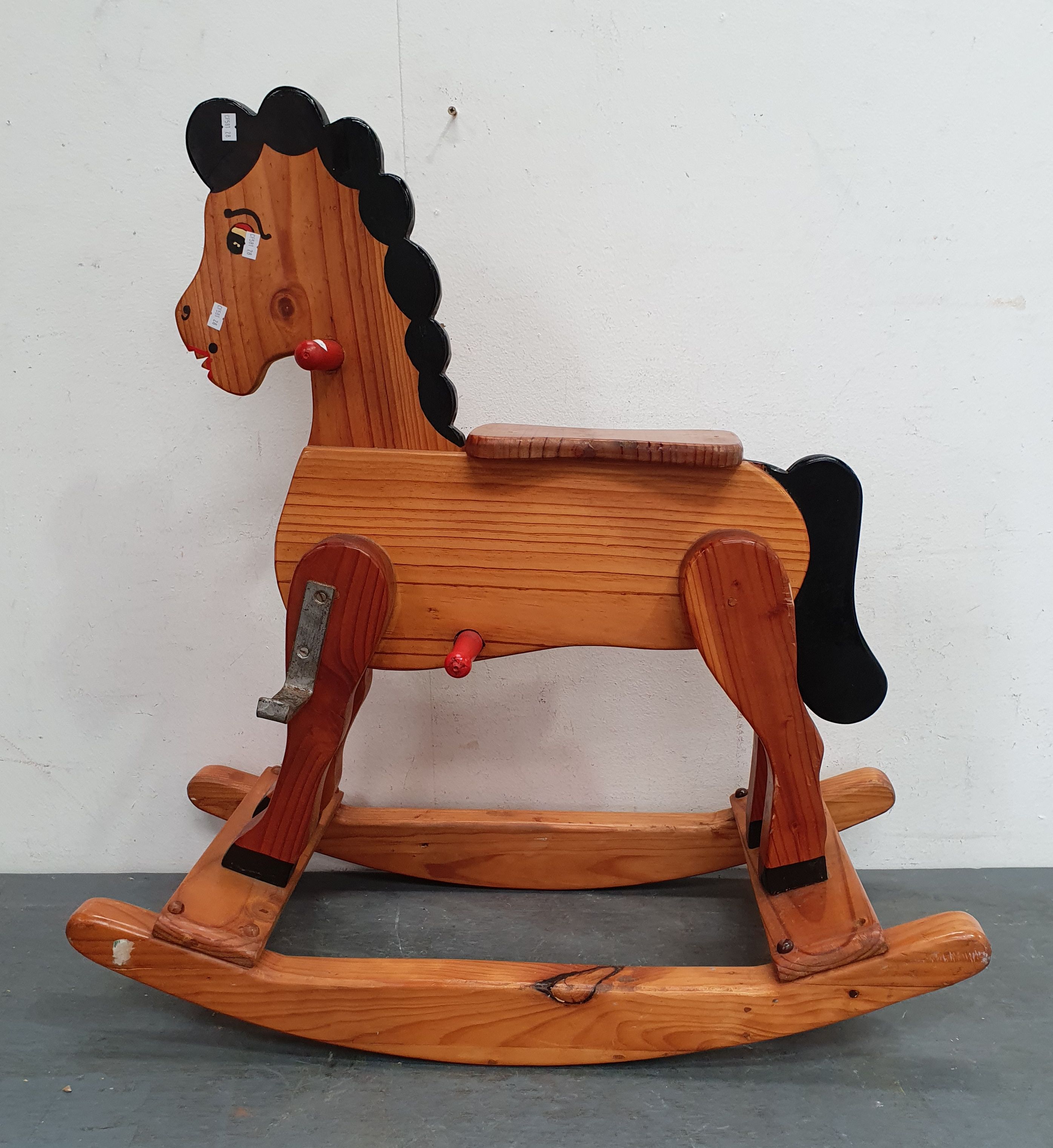 1318 · A WOODEN ROCKING HORSE