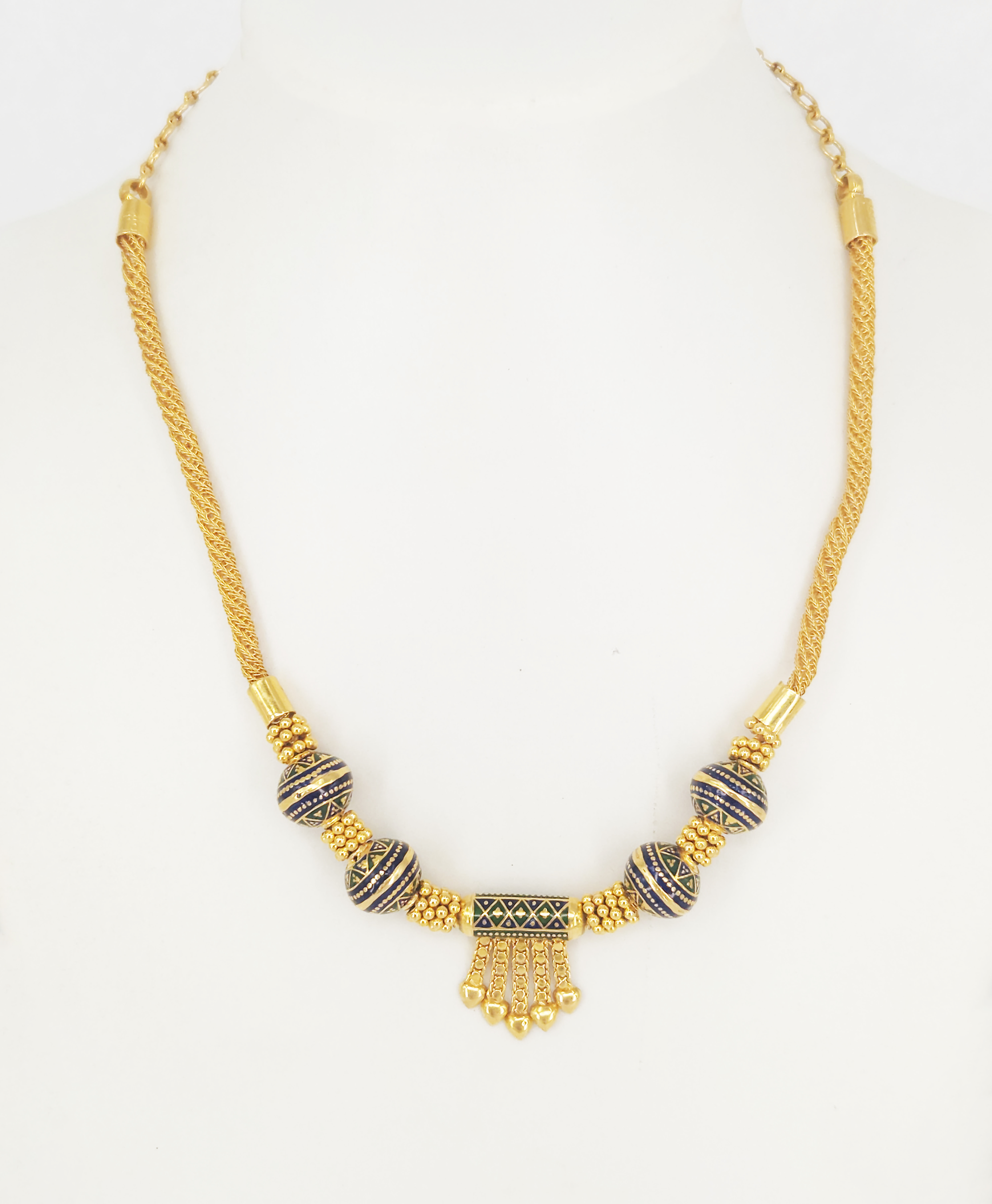 An Enamel And Gold Necklace