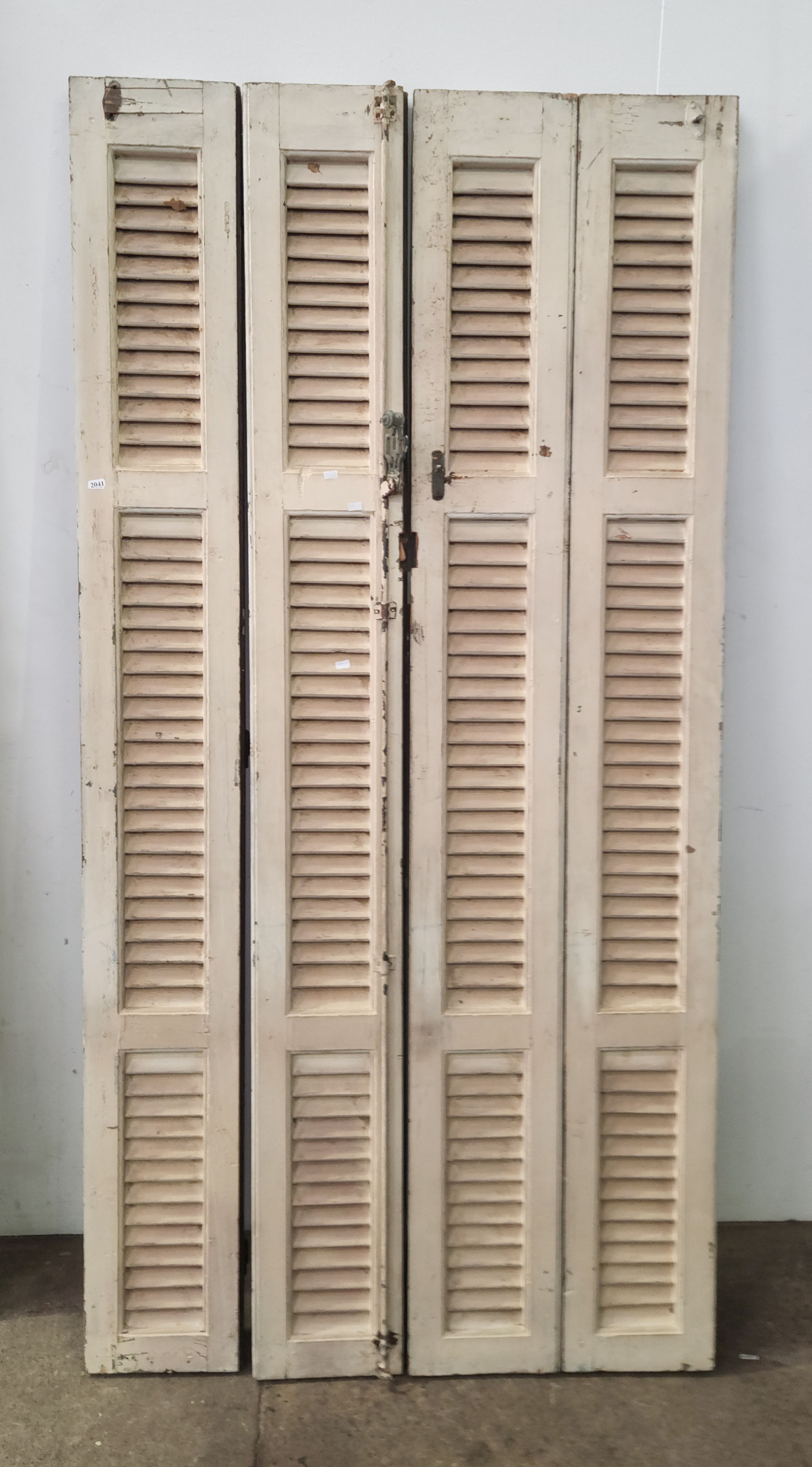 A Set Of Four Rustic Shutters