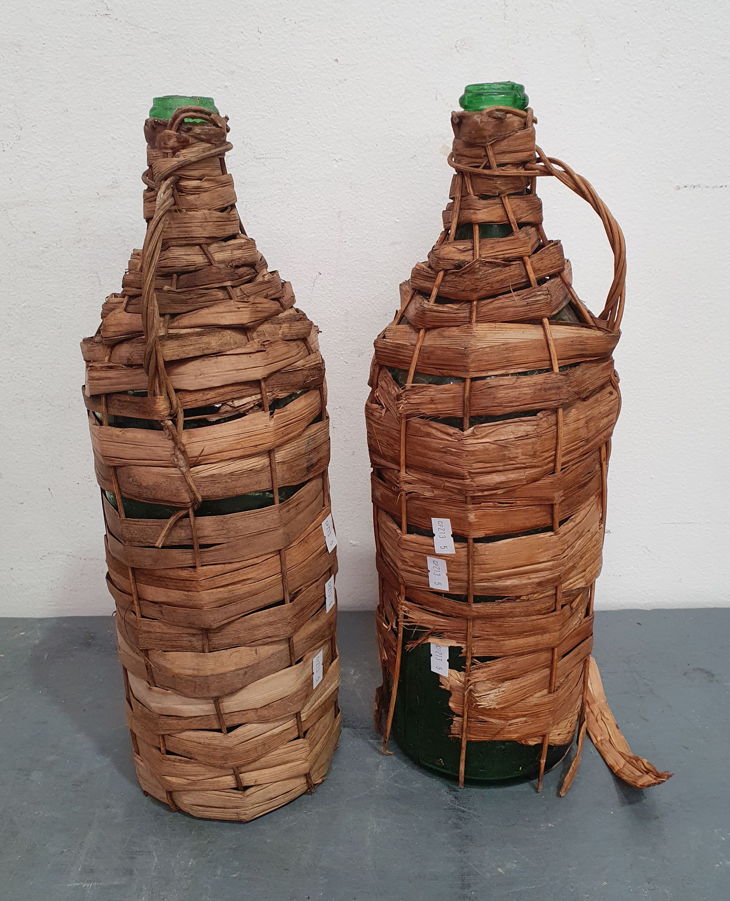 A PAIR OF GLASS BOTTLE