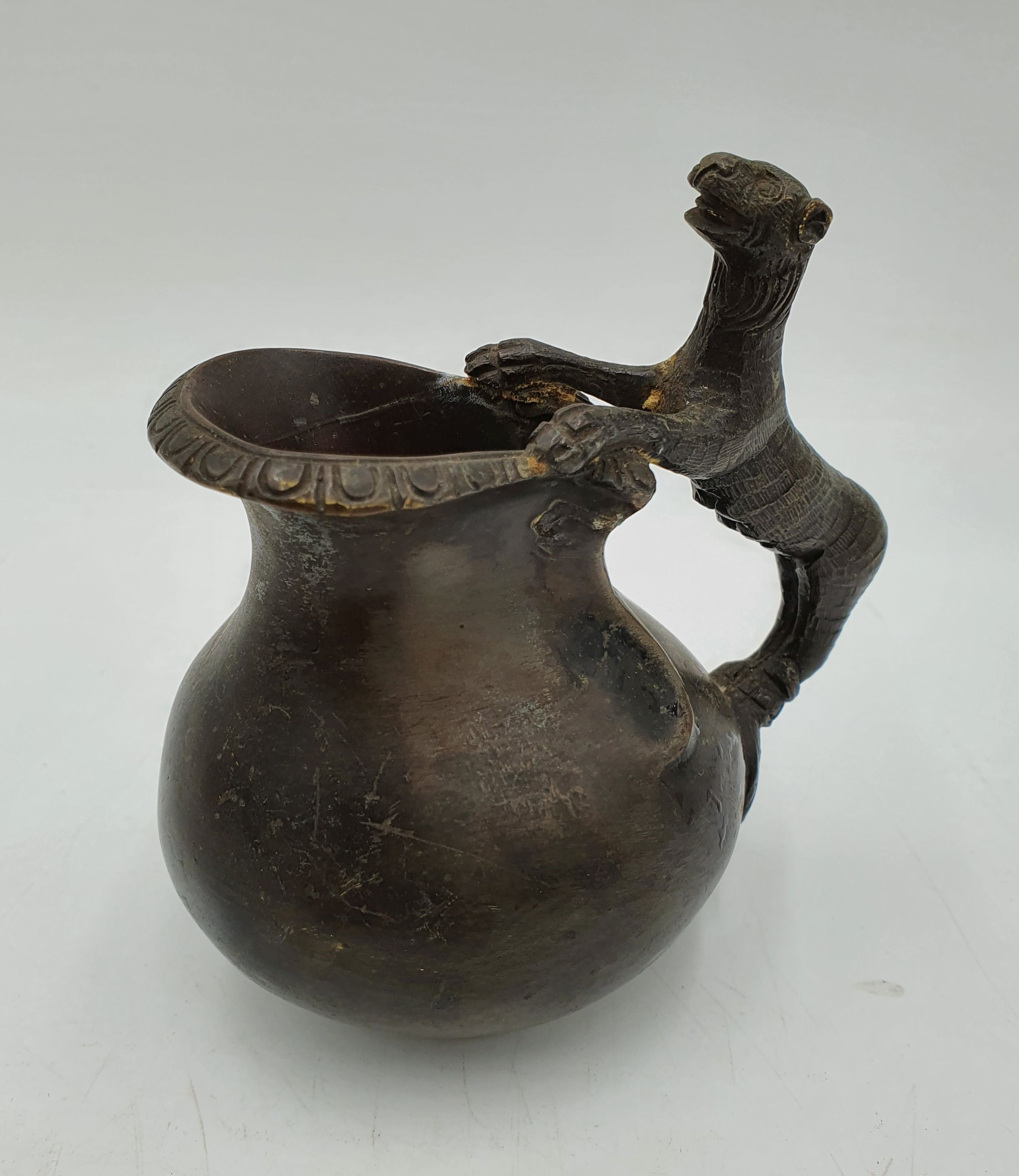 523 · A 19TH CENTURY BRONZE ASKOS JUG
