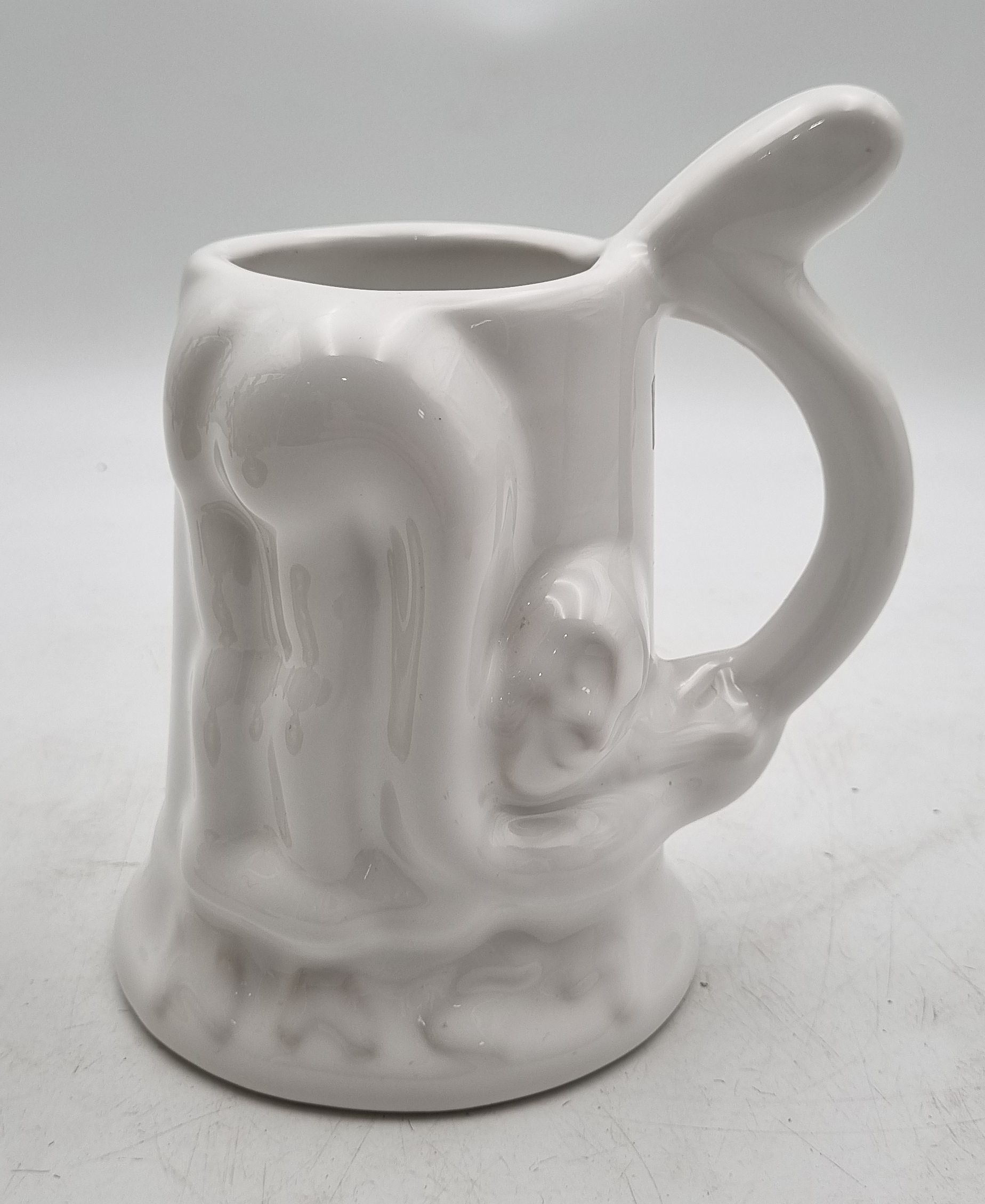 176 · CAROMA AUSTRALIA POTTERY AND WHITE GLAZED MUG