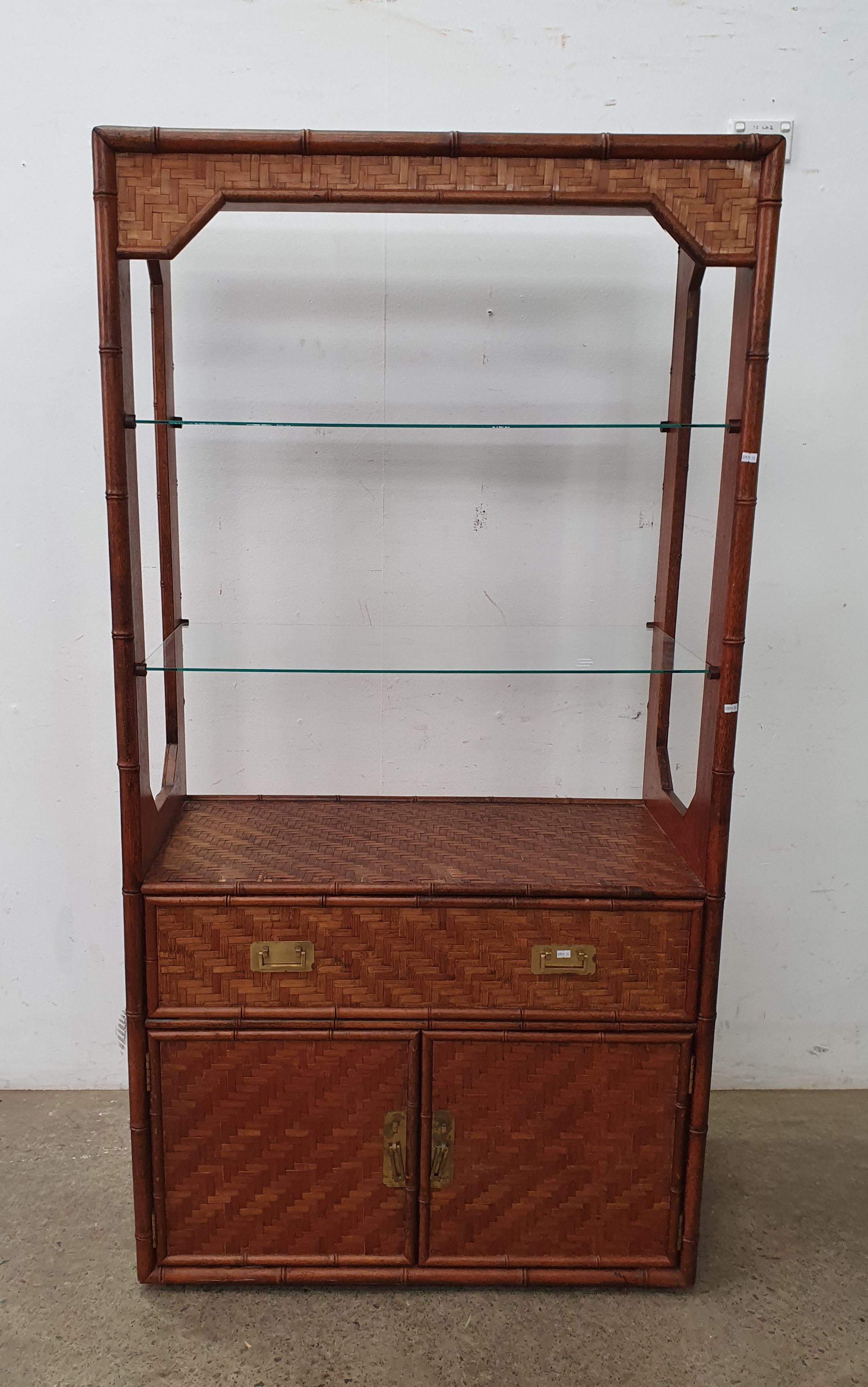 A Mid Century Oriental Style Cabinet