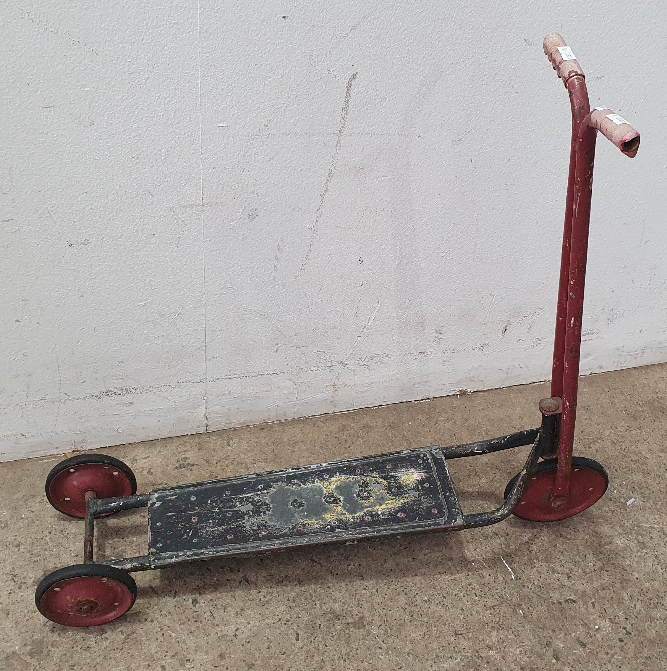 A VINTAGE SCOOTER