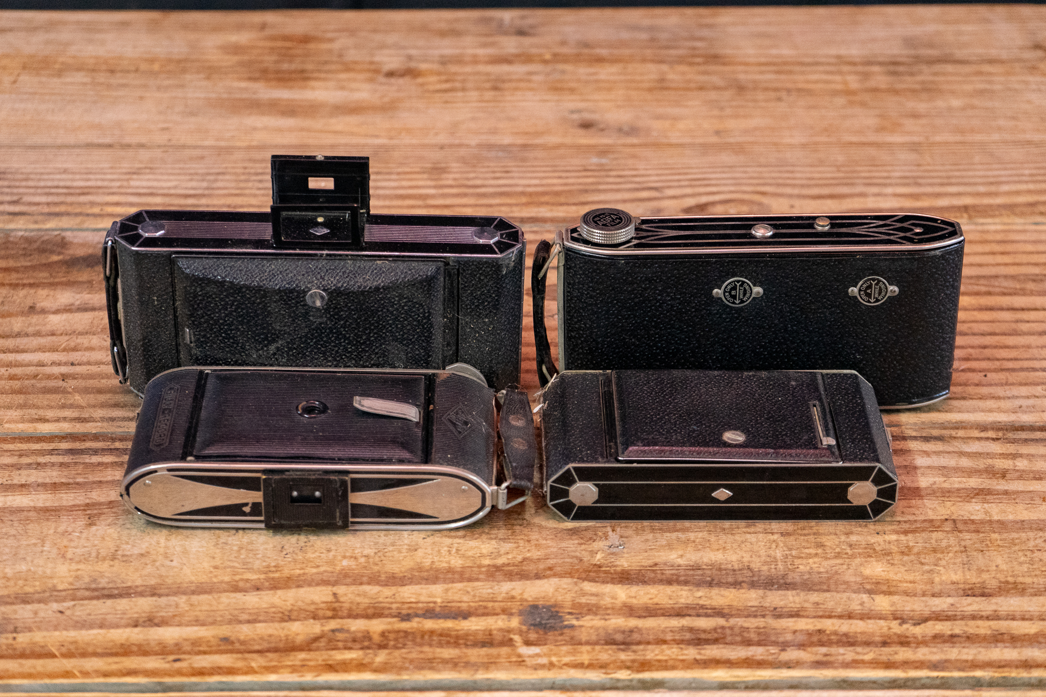 Four Art Deco Film Cameras | Harritt Group, Inc