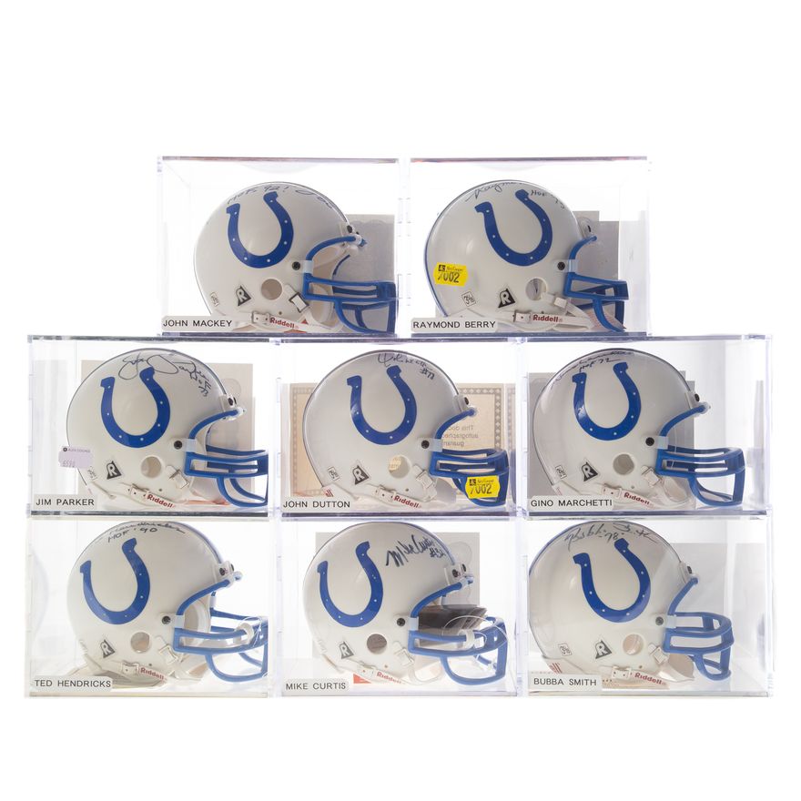 Eight Baltimore Colts signed mini helmets