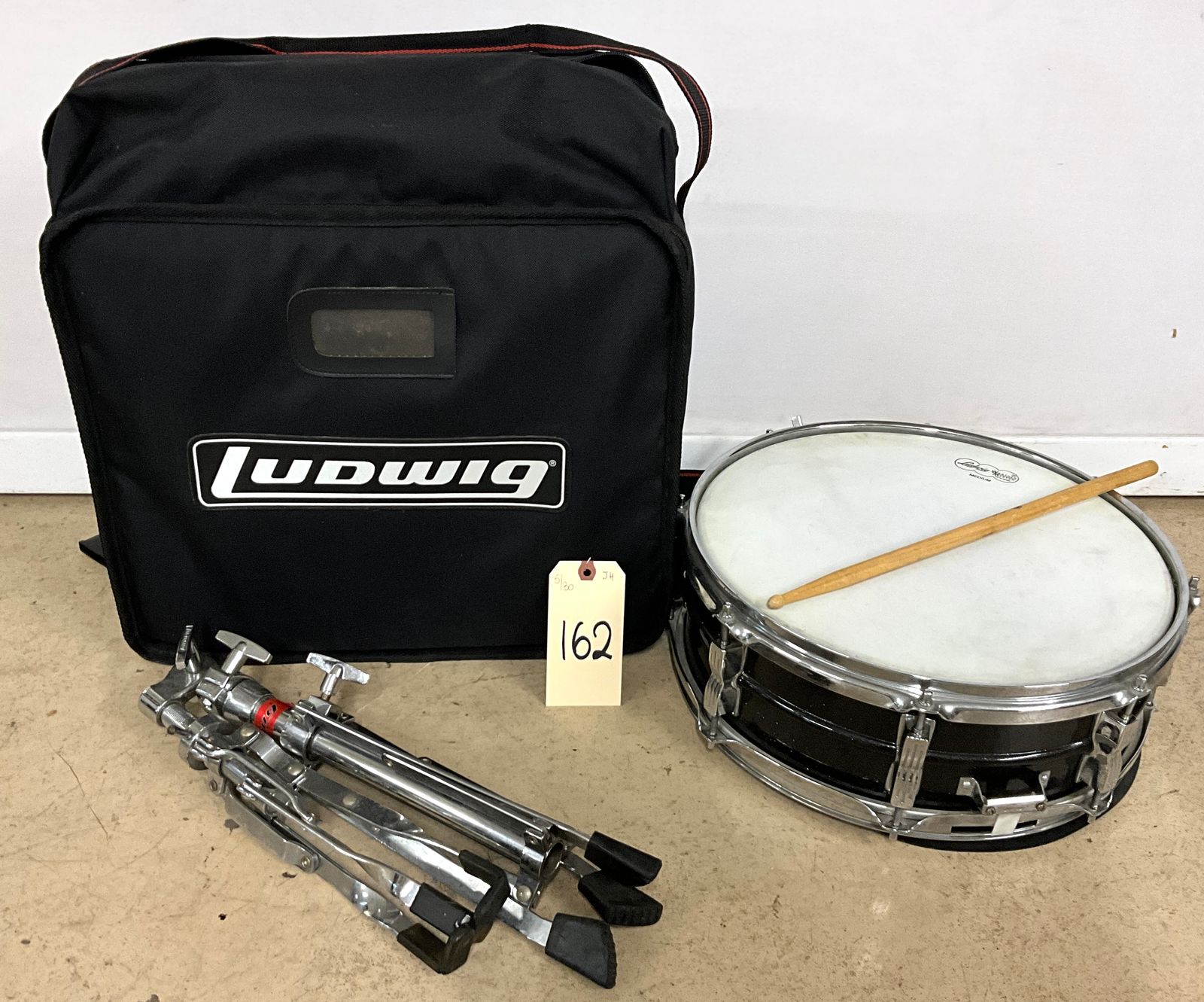 LUDWIG SNARE DRUM WITH CASE AND STAND. Teel Auctions