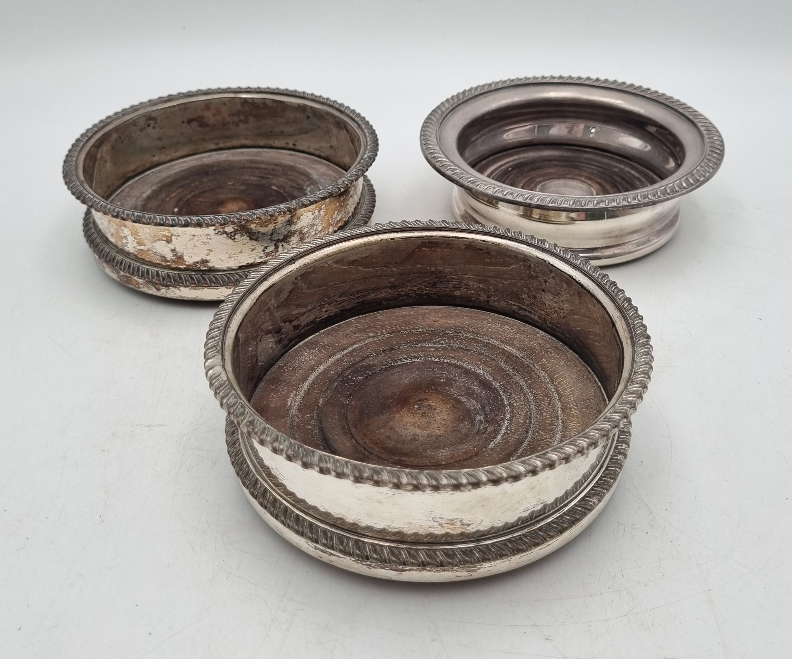 A Pair Of Silver On Copper Bottle Coasters