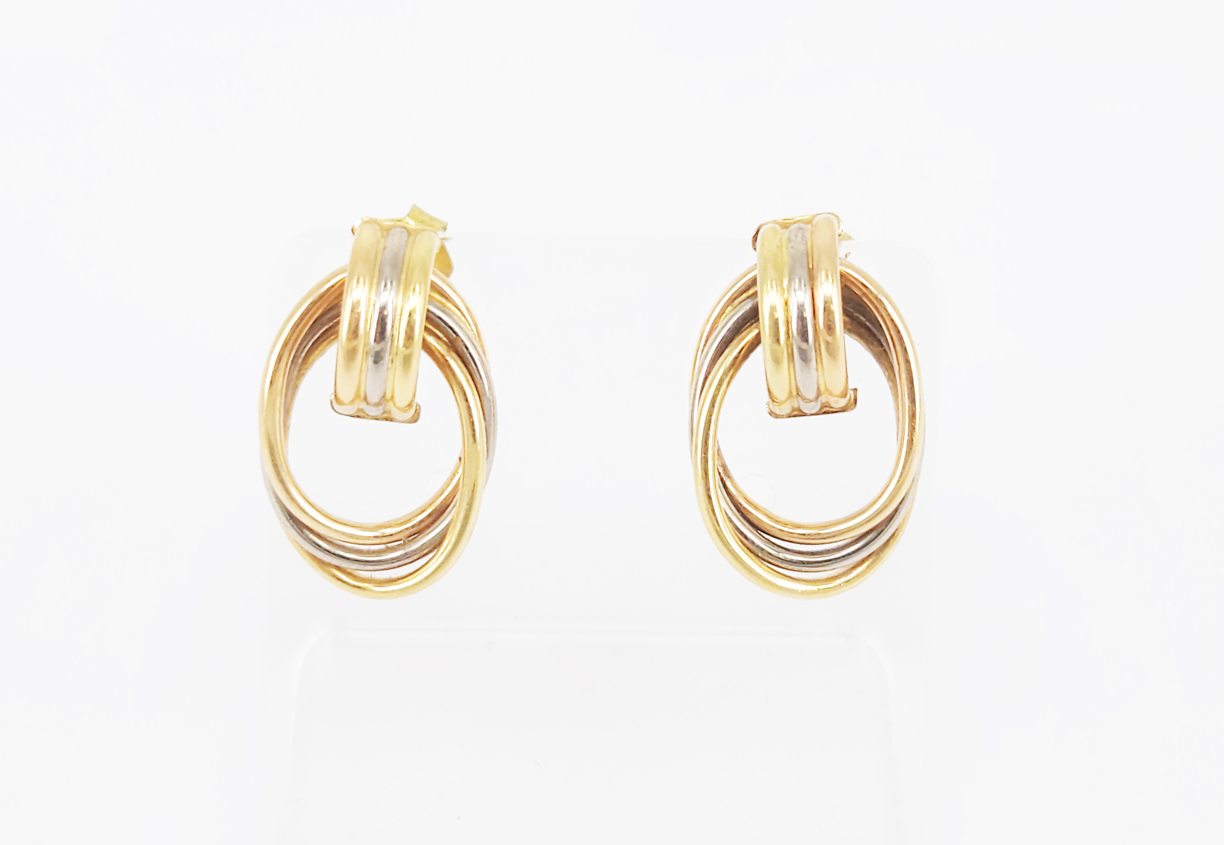 230 · A PAIR OF 9ct TRI-TONE HOOP EARRINGS
