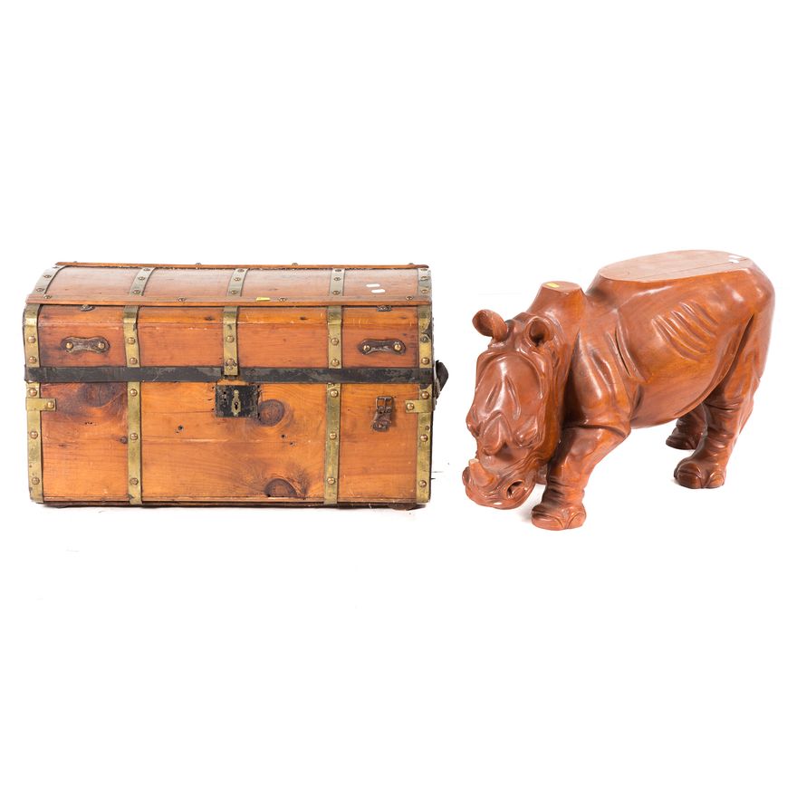 Wood trunk and a hardwood rhino-form table base