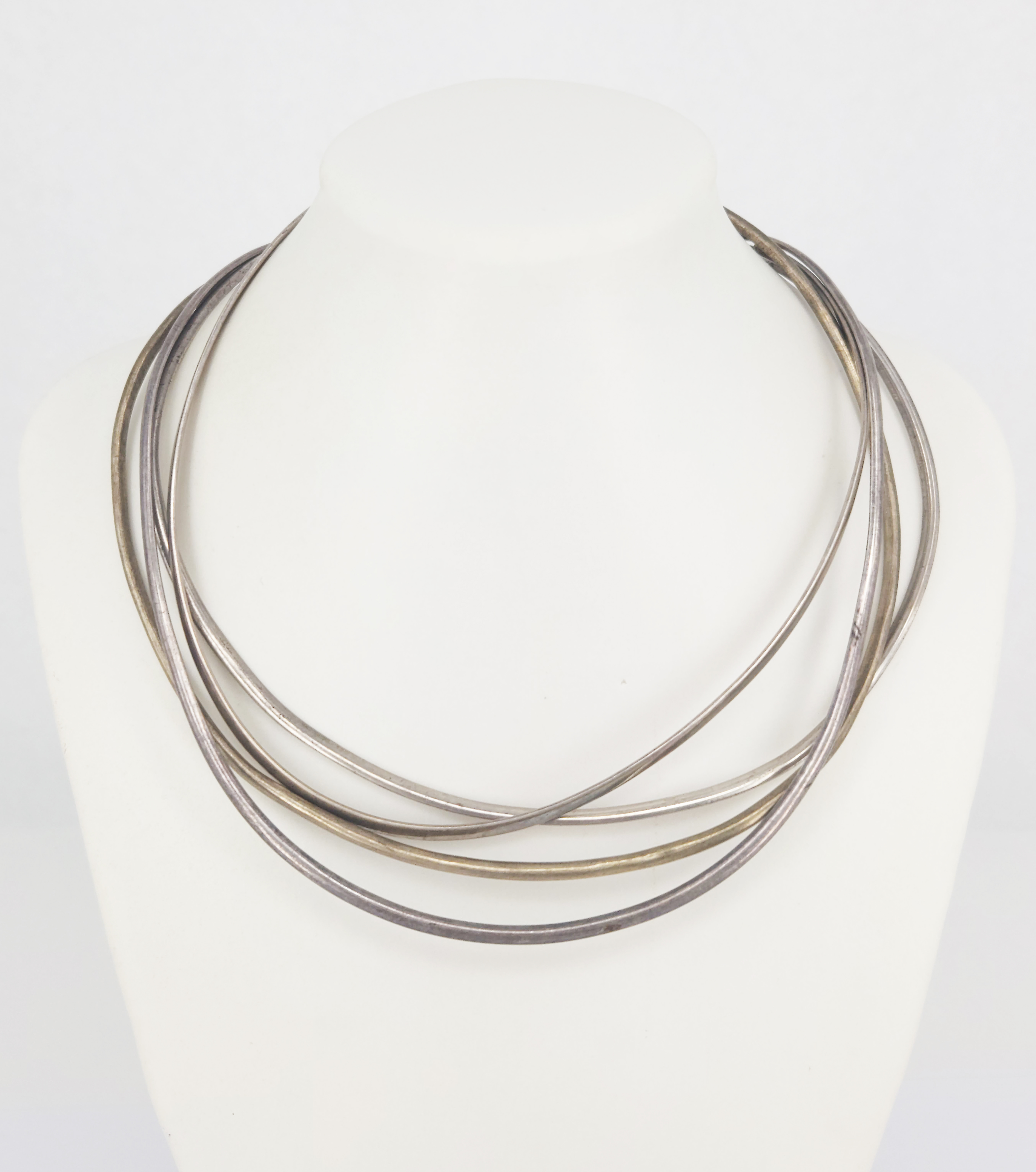 405 · FOUR SILVER COLLAR NECKLACES