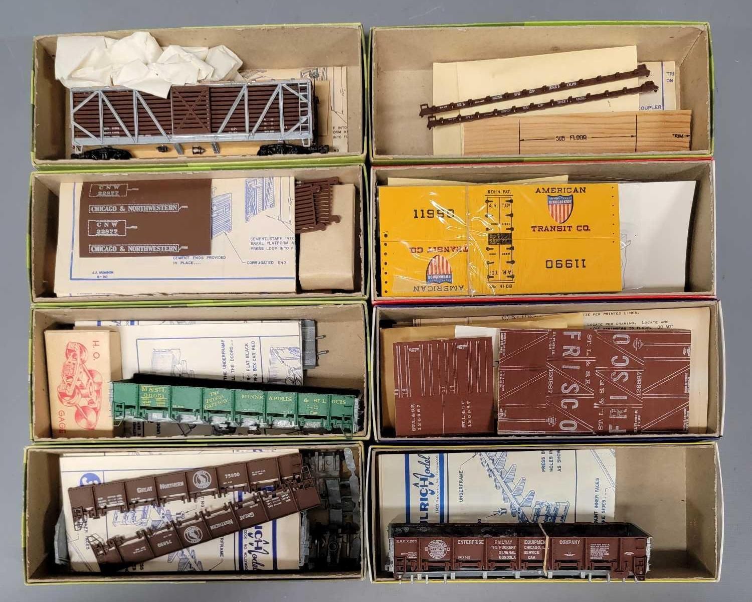 Seven unbuilt Ulrich HO scale freight car craftsman kits plus one