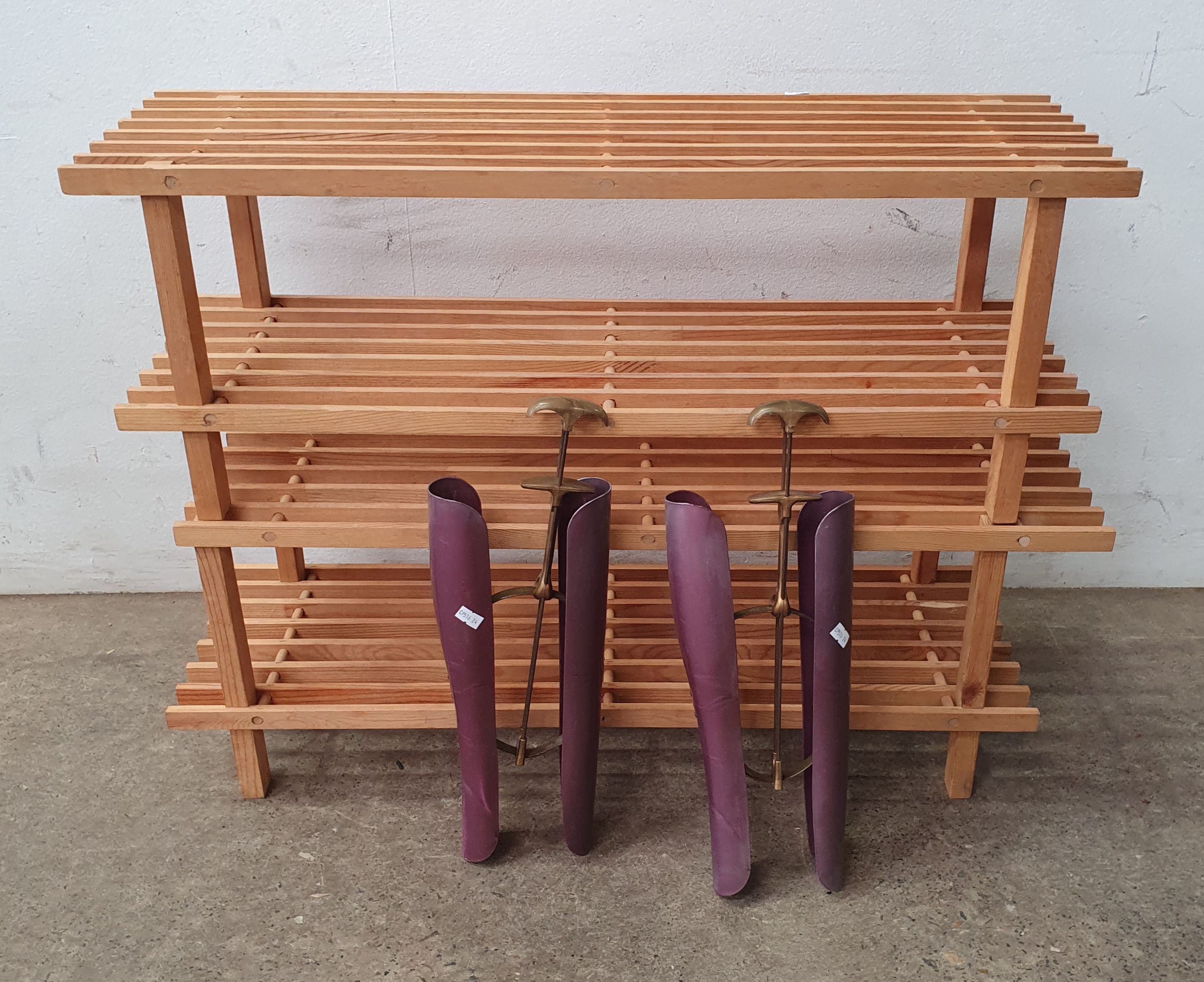 A PAIR OF SHOE RACKS