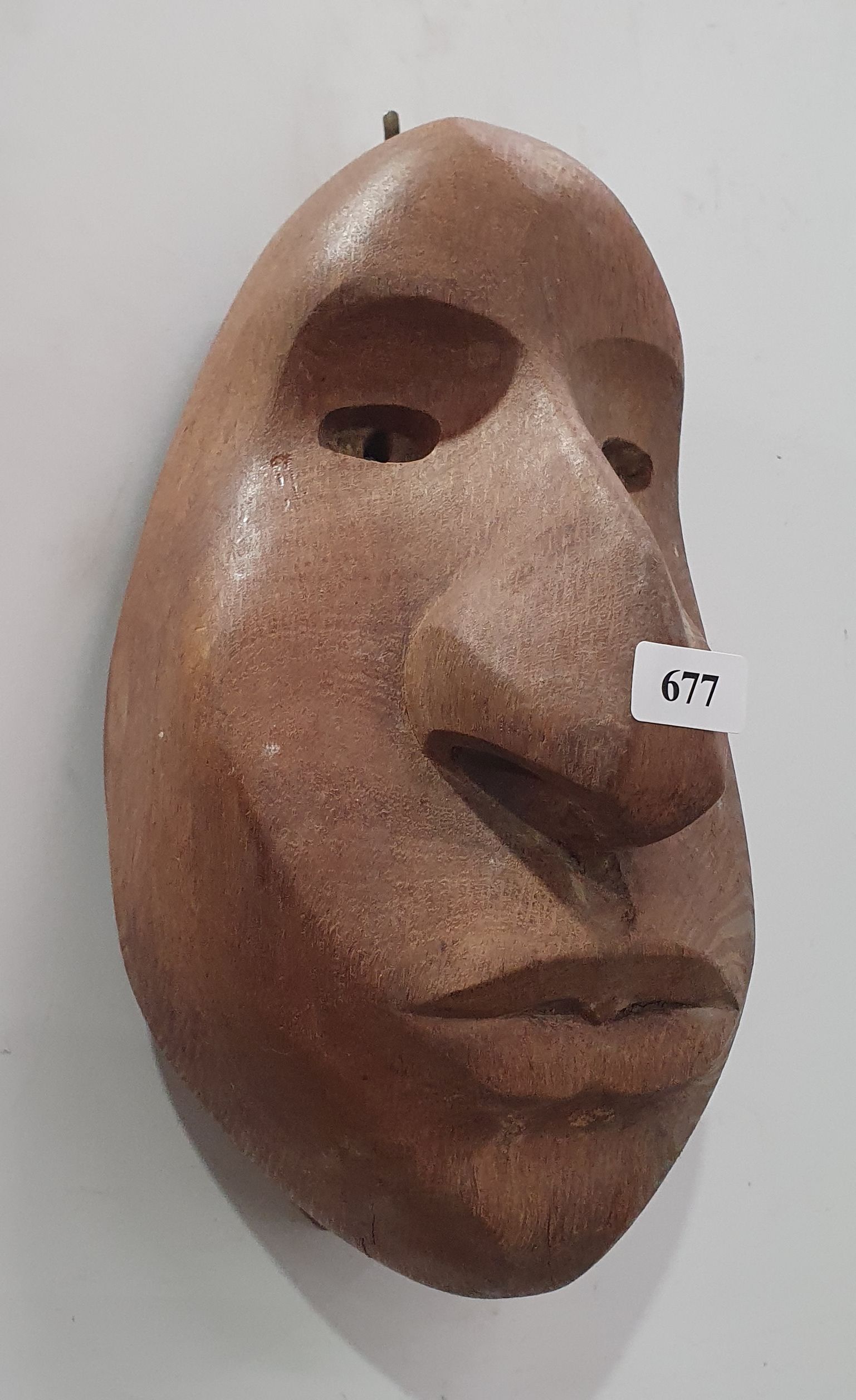 A Hand Carved Wooden Face Mask