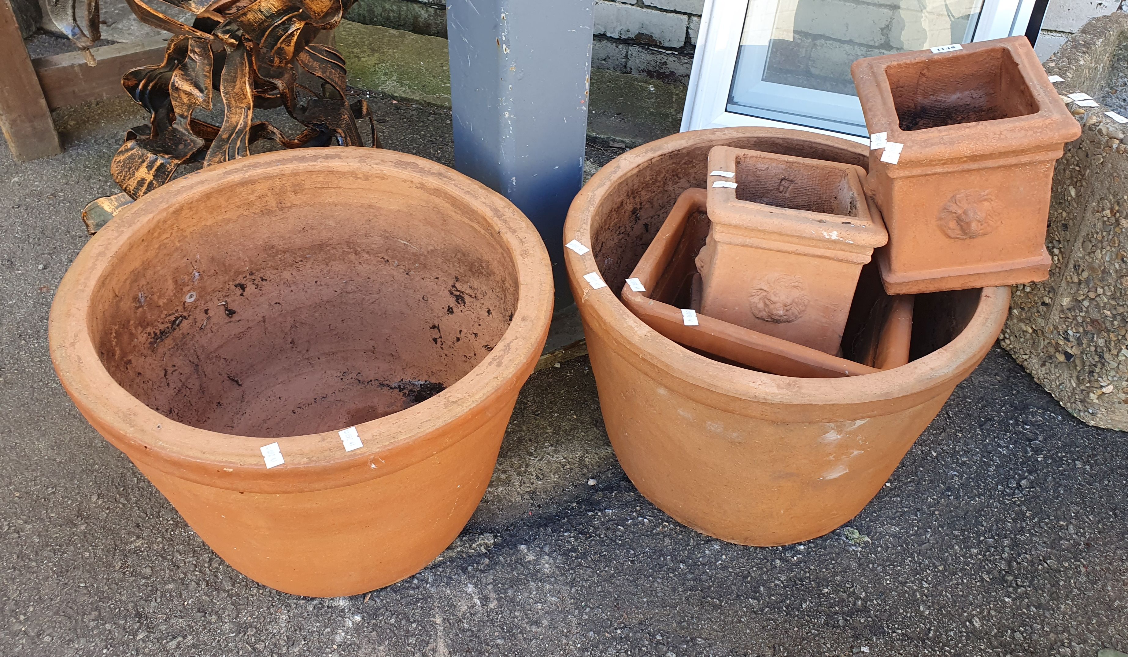 A Group Of Terracotta Pots