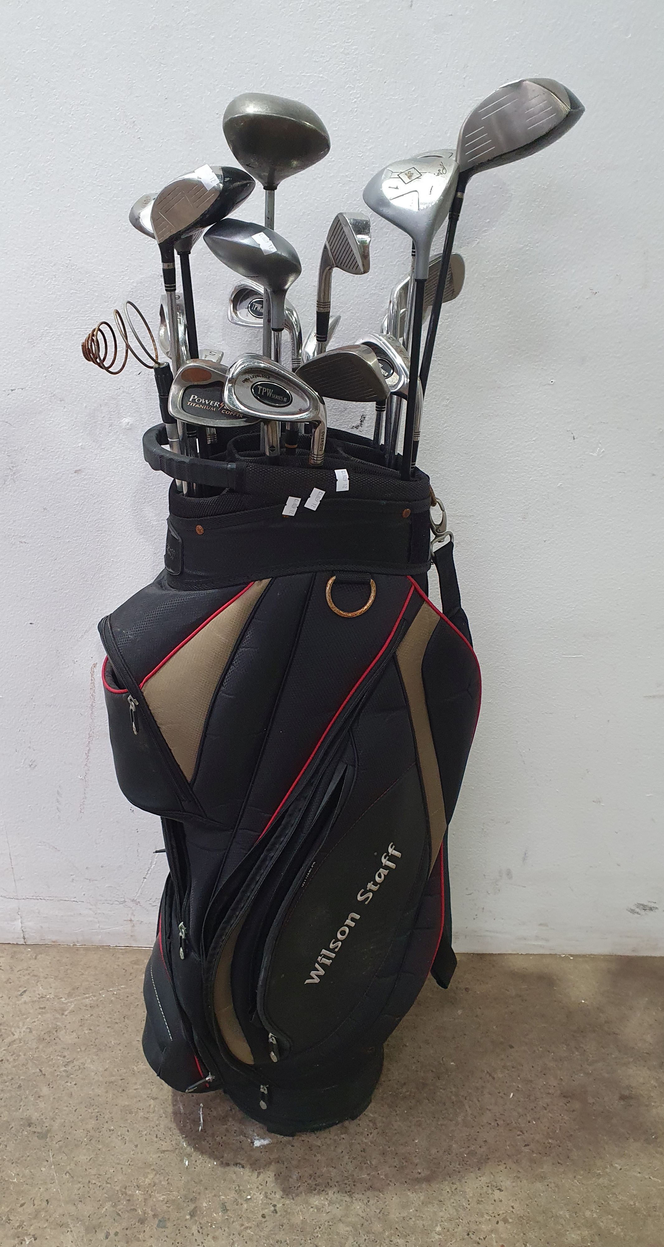 A Group Of Golf Clubs