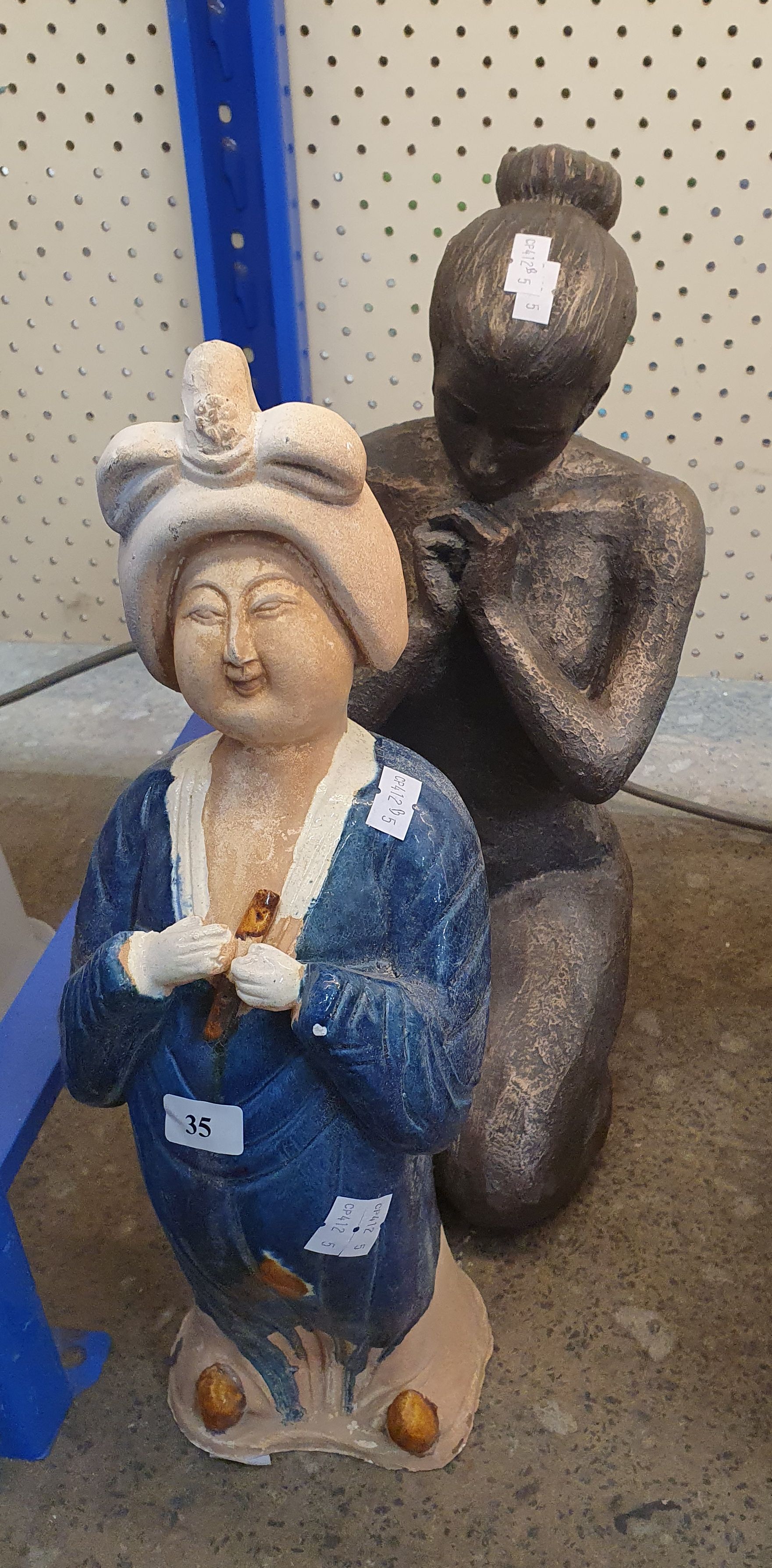 35 · TWO LADY FIGURES