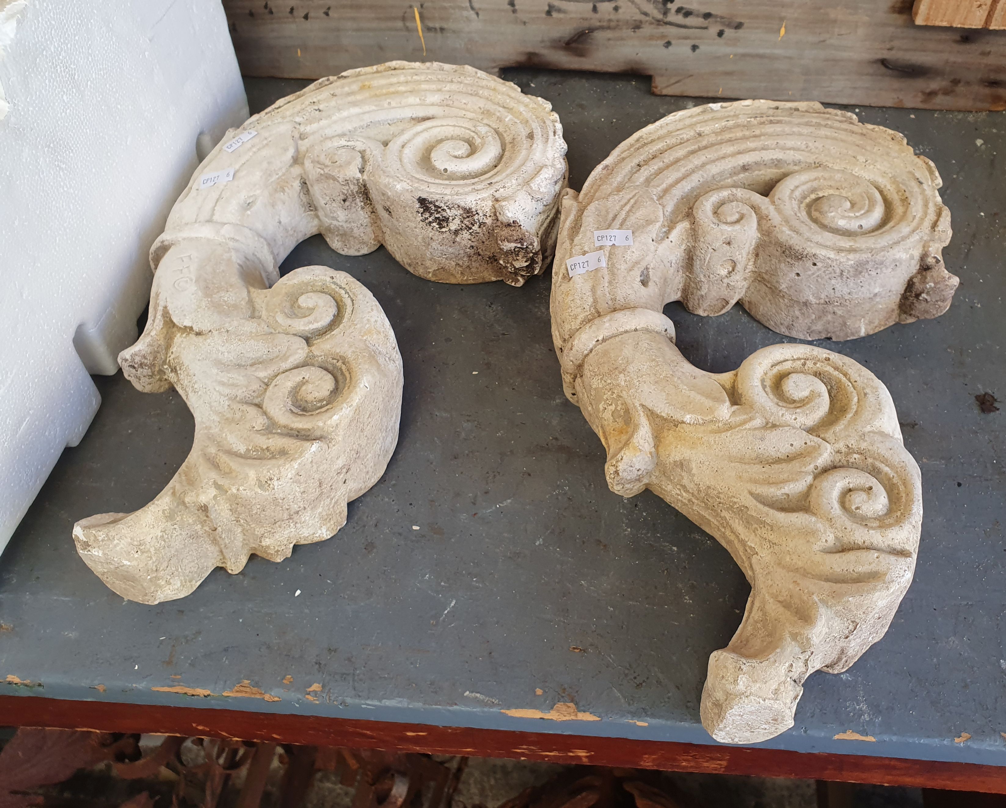 A Pair Of Concrete Decorative Items
