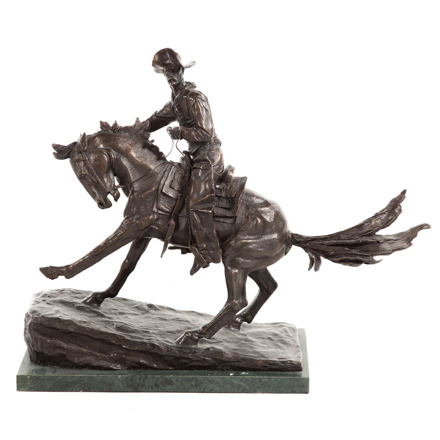 After Frederic Remington. The Cowboy bronze