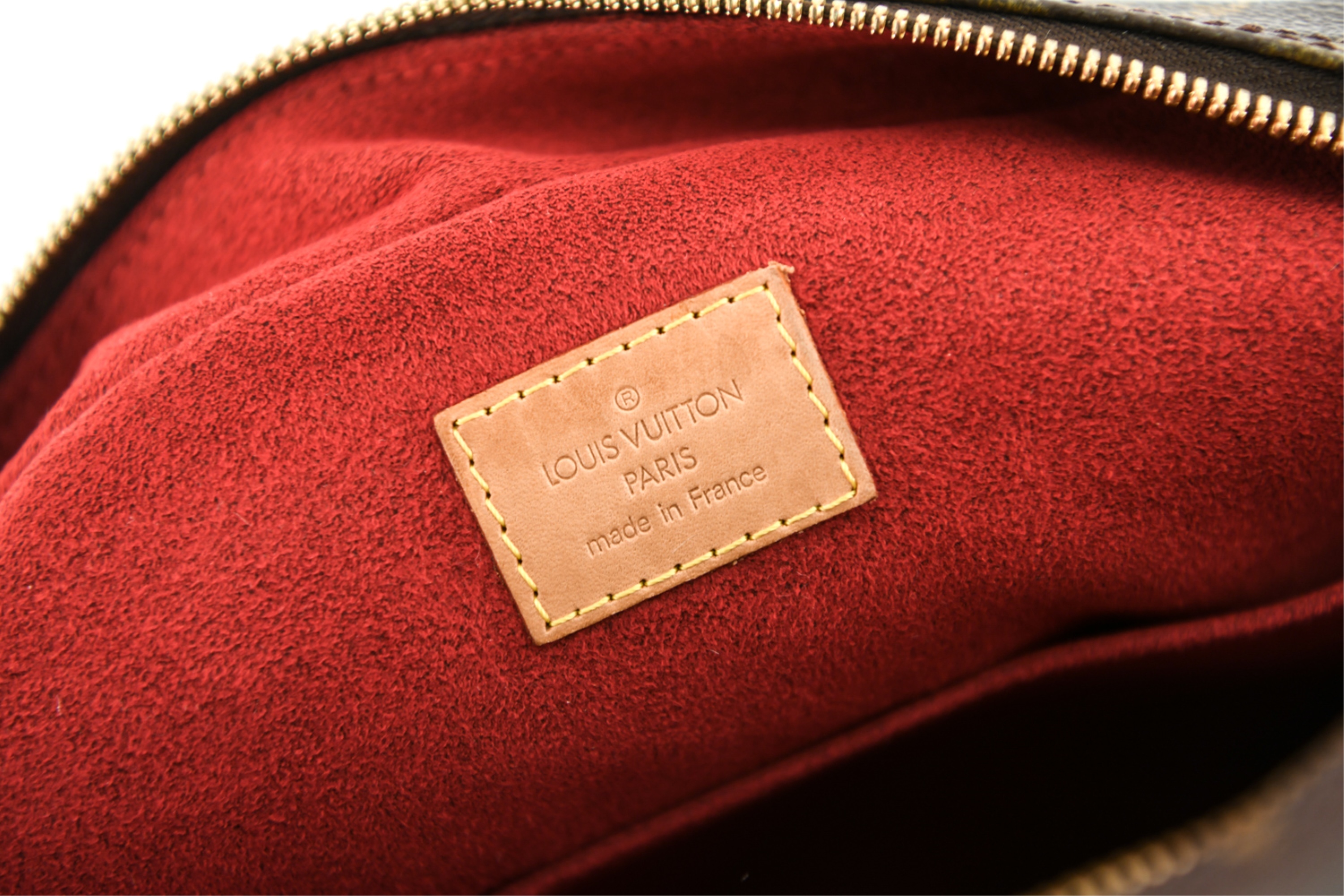 Sold at Auction: Louis Vuitton, LOUIS VUITTON EXCENTRI-CITE HANDBAG