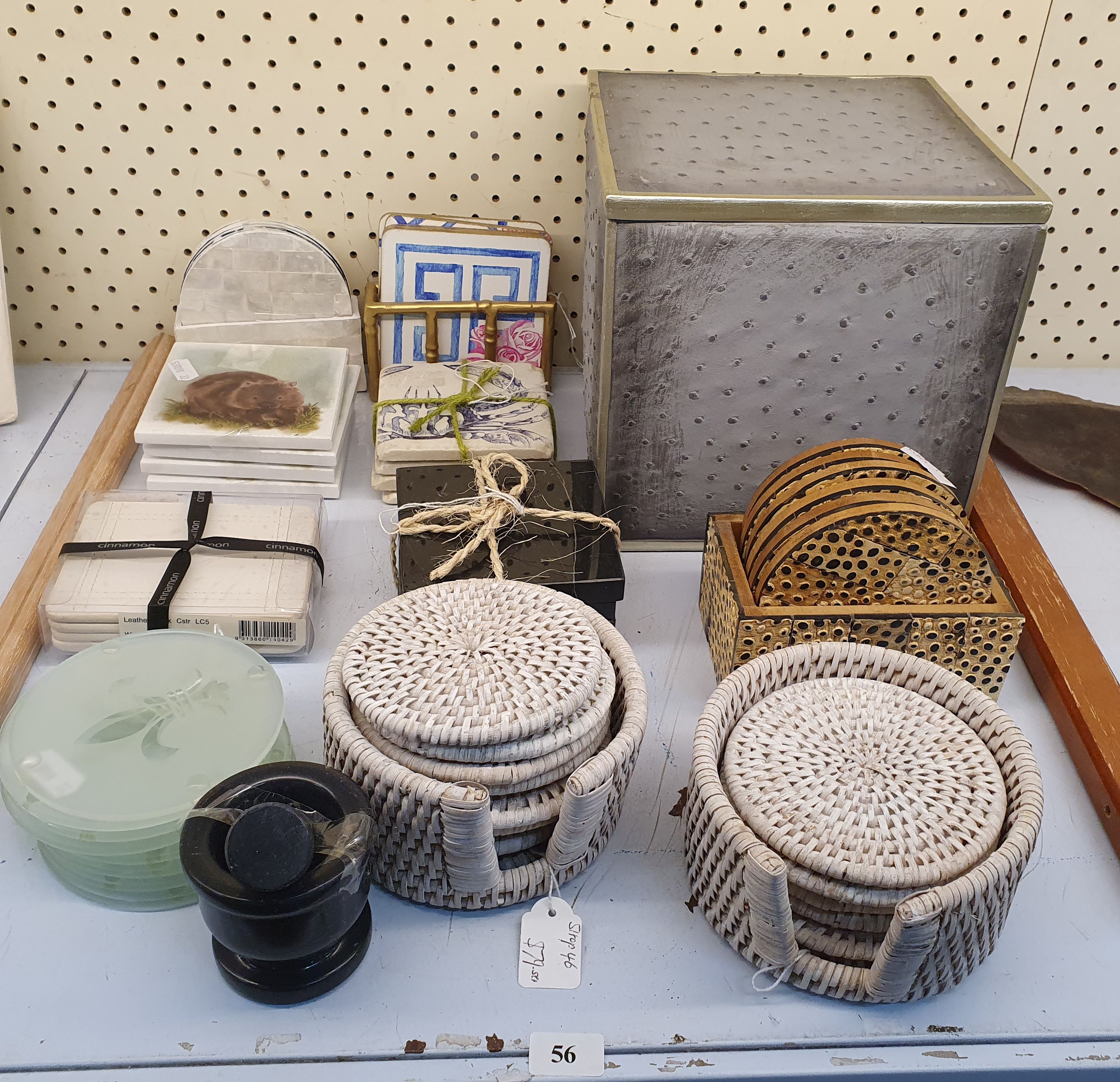 56 · A GROUP OF CONTEMPORARY DRINK COASTERS